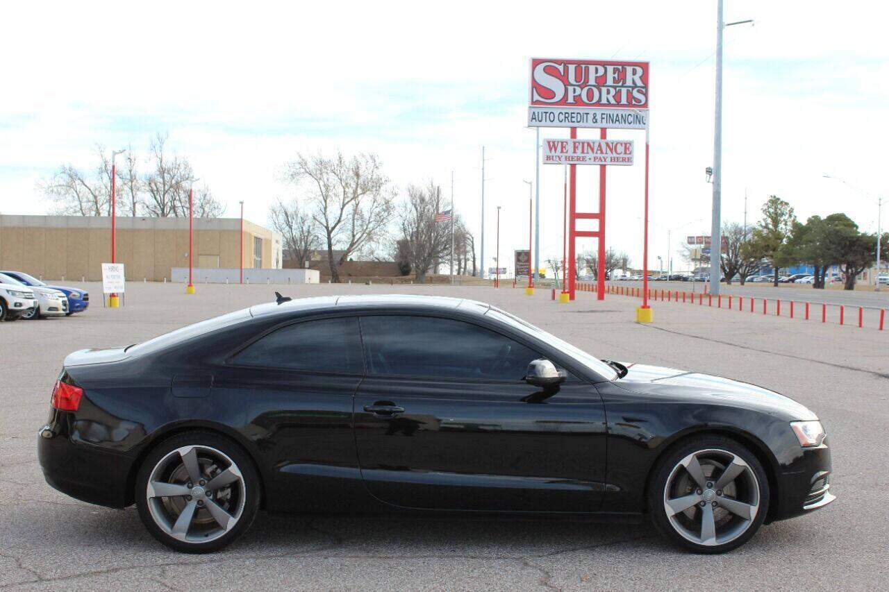 2014 Black Audi A5 Coupe 2.0T quattro Tiptronic (WAULFAFR0EA) with an 2.0L I4 Turbocharger 2.0L I4 engine, Automatic 8-Speed transmission, located at 4301 NW 39th , Oklahoma City, OK, 73112, (405) 949-5600, 35.512135, -97.598671 - NO DRIVERS LICENCE NO-FULL COVERAGE INSURANCE-NO CREDIT CHECK. COME ON OVER TO SUPERSPORTS AND TAKE A LOOK AND TEST DRIVE PLEASE GIVE US A CALL AT (405) 949-5600. NO LICENSIA DE MANEJAR- NO SEGURO DE COBERTURA TOTAL- NO VERIFICACCION DE CREDITO. POR FAVOR VENGAN A SUPERSPORTS, ECHE UN VIS - Photo#3