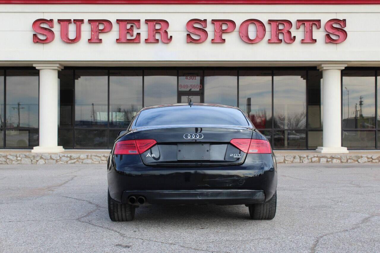 2014 Black Audi A5 Coupe 2.0T quattro Tiptronic (WAULFAFR0EA) with an 2.0L I4 Turbocharger 2.0L I4 engine, Automatic 8-Speed transmission, located at 4301 NW 39th , Oklahoma City, OK, 73112, (405) 949-5600, 35.512135, -97.598671 - NO DRIVERS LICENCE NO-FULL COVERAGE INSURANCE-NO CREDIT CHECK. COME ON OVER TO SUPERSPORTS AND TAKE A LOOK AND TEST DRIVE PLEASE GIVE US A CALL AT (405) 949-5600. NO LICENSIA DE MANEJAR- NO SEGURO DE COBERTURA TOTAL- NO VERIFICACCION DE CREDITO. POR FAVOR VENGAN A SUPERSPORTS, ECHE UN VIS - Photo#4