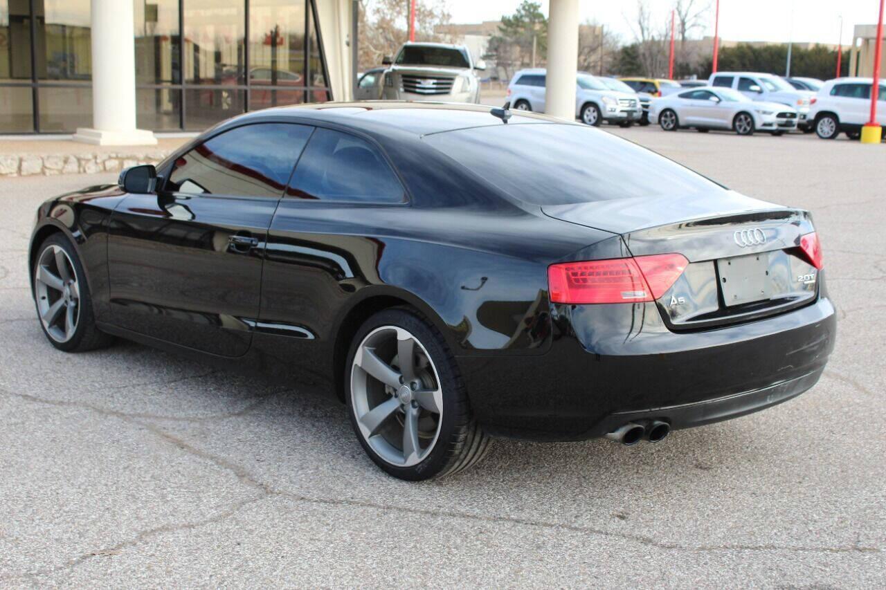 2014 Black Audi A5 Coupe 2.0T quattro Tiptronic (WAULFAFR0EA) with an 2.0L I4 Turbocharger 2.0L I4 engine, Automatic 8-Speed transmission, located at 4301 NW 39th , Oklahoma City, OK, 73112, (405) 949-5600, 35.512135, -97.598671 - NO DRIVERS LICENCE NO-FULL COVERAGE INSURANCE-NO CREDIT CHECK. COME ON OVER TO SUPERSPORTS AND TAKE A LOOK AND TEST DRIVE PLEASE GIVE US A CALL AT (405) 949-5600. NO LICENSIA DE MANEJAR- NO SEGURO DE COBERTURA TOTAL- NO VERIFICACCION DE CREDITO. POR FAVOR VENGAN A SUPERSPORTS, ECHE UN VIS - Photo#5