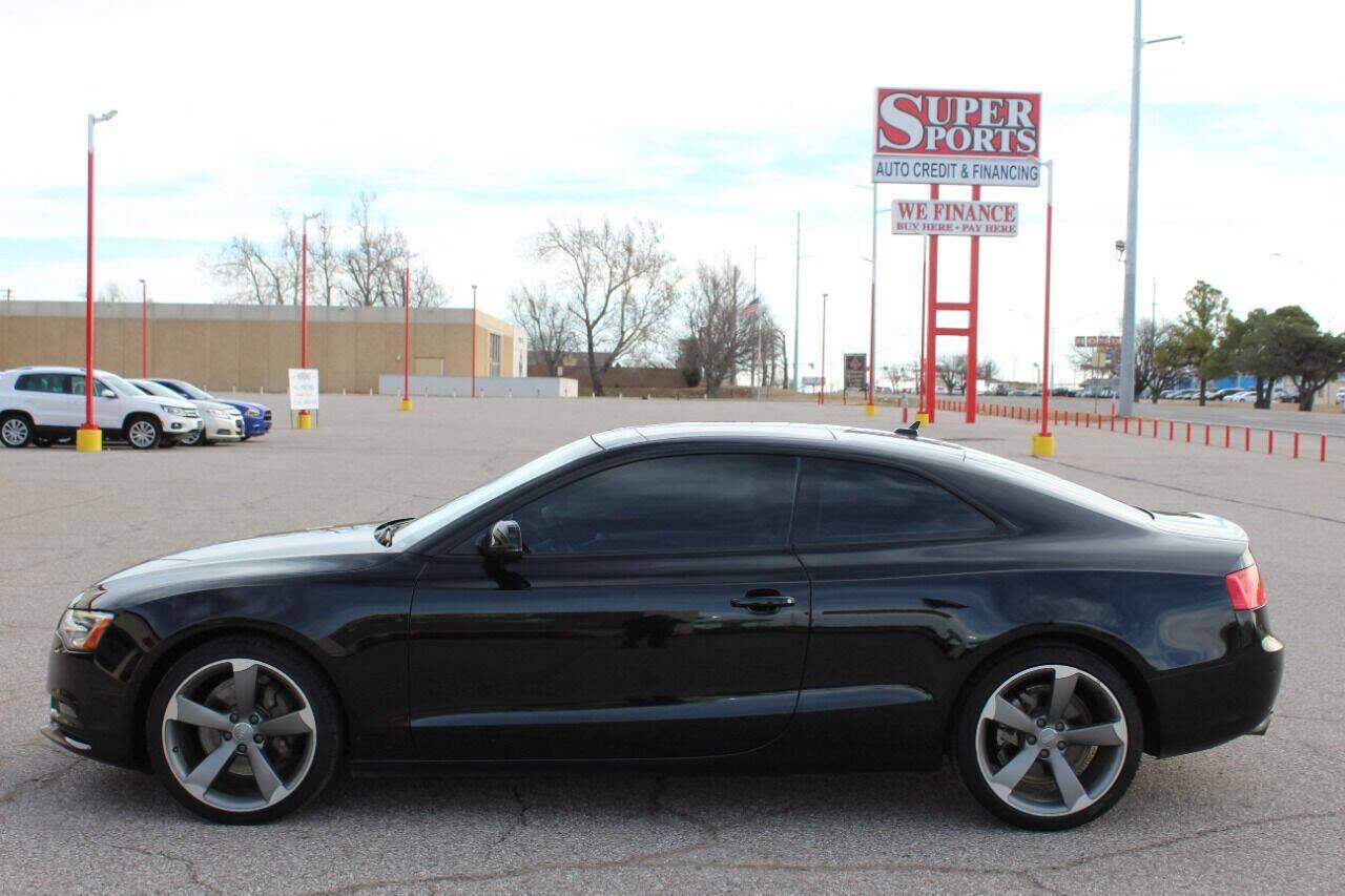 2014 Black Audi A5 Coupe 2.0T quattro Tiptronic (WAULFAFR0EA) with an 2.0L I4 Turbocharger 2.0L I4 engine, Automatic 8-Speed transmission, located at 4301 NW 39th , Oklahoma City, OK, 73112, (405) 949-5600, 35.512135, -97.598671 - NO DRIVERS LICENCE NO-FULL COVERAGE INSURANCE-NO CREDIT CHECK. COME ON OVER TO SUPERSPORTS AND TAKE A LOOK AND TEST DRIVE PLEASE GIVE US A CALL AT (405) 949-5600. NO LICENSIA DE MANEJAR- NO SEGURO DE COBERTURA TOTAL- NO VERIFICACCION DE CREDITO. POR FAVOR VENGAN A SUPERSPORTS, ECHE UN VIS - Photo#6