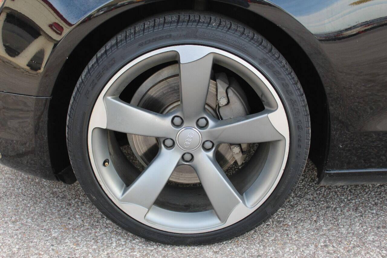 2014 Black Audi A5 Coupe 2.0T quattro Tiptronic (WAULFAFR0EA) with an 2.0L I4 Turbocharger 2.0L I4 engine, Automatic 8-Speed transmission, located at 4301 NW 39th , Oklahoma City, OK, 73112, (405) 949-5600, 35.512135, -97.598671 - NO DRIVERS LICENCE NO-FULL COVERAGE INSURANCE-NO CREDIT CHECK. COME ON OVER TO SUPERSPORTS AND TAKE A LOOK AND TEST DRIVE PLEASE GIVE US A CALL AT (405) 949-5600. NO LICENSIA DE MANEJAR- NO SEGURO DE COBERTURA TOTAL- NO VERIFICACCION DE CREDITO. POR FAVOR VENGAN A SUPERSPORTS, ECHE UN VIS - Photo#7