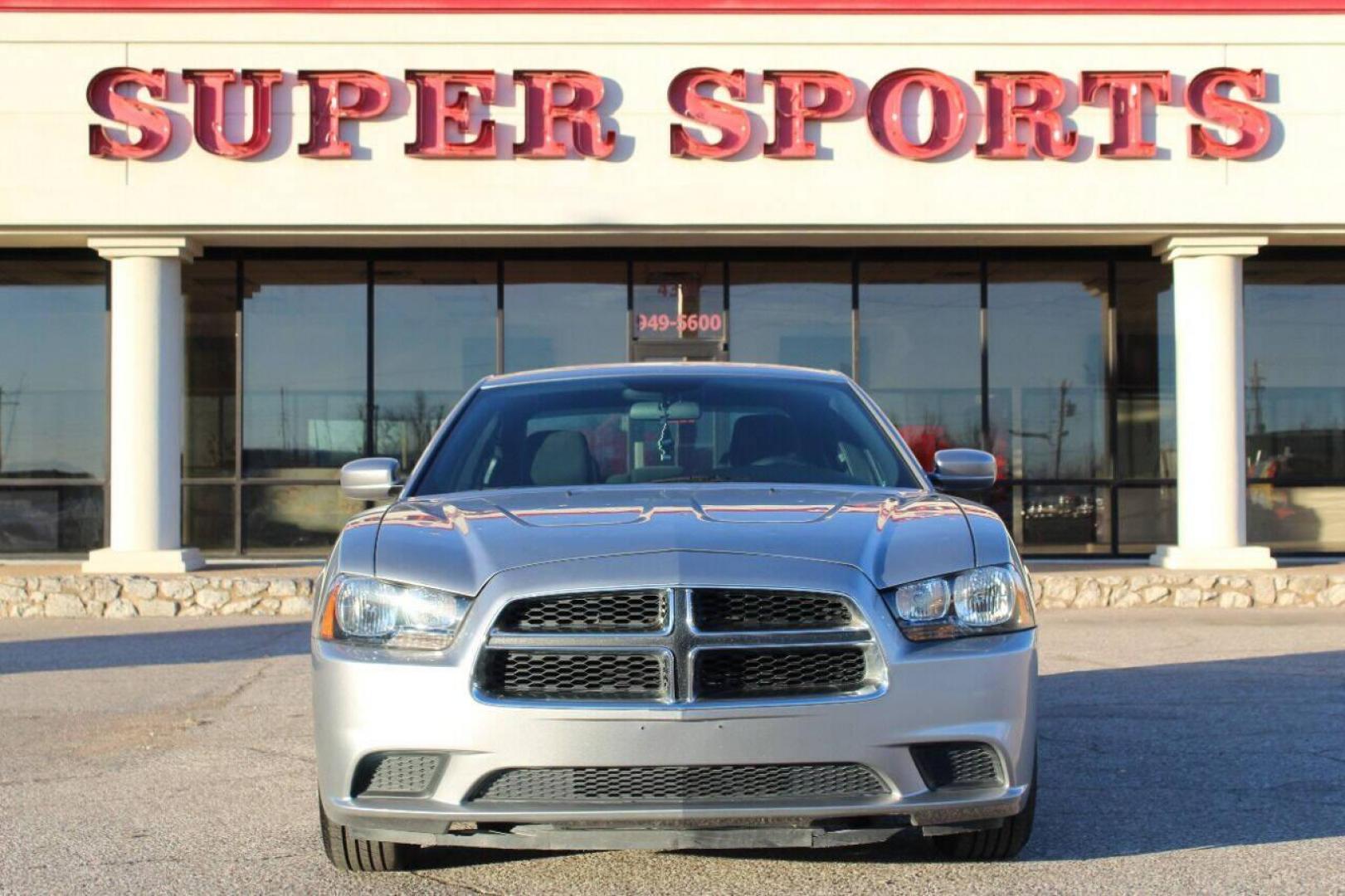 2014 Silver Dodge Charger SE (2C3CDXBG8EH) with an 3.6L V6 DOHC 24V engine, 5-Speed Automatic transmission, located at 4301 NW 39th , Oklahoma City, OK, 73112, (405) 949-5600, 35.512135, -97.598671 - Photo#0
