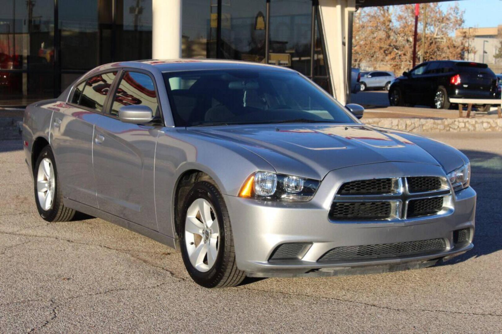 2014 Silver Dodge Charger SE (2C3CDXBG8EH) with an 3.6L V6 DOHC 24V engine, 5-Speed Automatic transmission, located at 4301 NW 39th , Oklahoma City, OK, 73112, (405) 949-5600, 35.512135, -97.598671 - NO DRIVERS LICENSE - NO FULL COVERAGE INSURANCE - NO CREDIT CHECK. COME ON OVER TO SUPERSPORTS AND TAKE A LOOK AND TEST DRIVE PLEASE GIVE US A CALL AT (405) 949-5600. NO LICENCIA DE MANEJAR - NO SEGURO DE COBERTURA TOTAL - NO VERIFICACION DE CREDITO. POR FAVOR VENGAN A SUPERSPOR - Photo#2