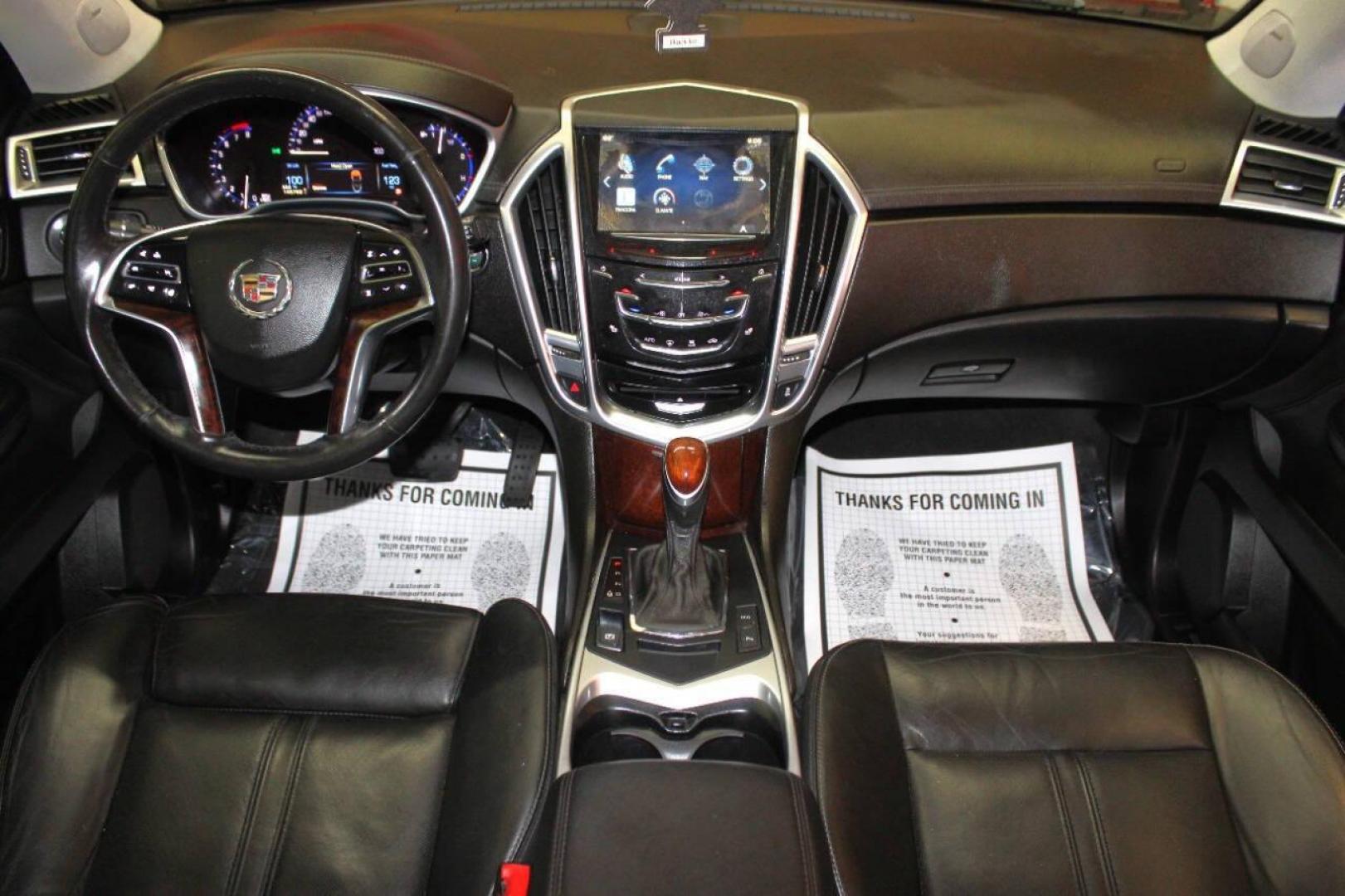 2013 Black Cadillac SRX Premium (3GYFNCE3XDS) with an 3.6L V6 DOHC 24V FFV engine, 6-Speed Automatic transmission, located at 4301 NW 39th , Oklahoma City, OK, 73112, (405) 949-5600, 35.512135, -97.598671 - NO DRIVERS LICENCE NO-FULL COVERAGE INSURANCE-NO CREDIT CHECK. COME ON OVER TO SUPERSPORTS AND TAKE A LOOK AND TEST DRIVE. PLEASE GIVE US A CALL AT (405) 949-5600. NO LICENSIA DE MANEJAR- NO SEGURO DE COBERTURA TOTAL- NO VERIFICACCION DE CREDITO. POR FAVOR VENGAN A SUPERSPORTS, ECHE UN - Photo#18