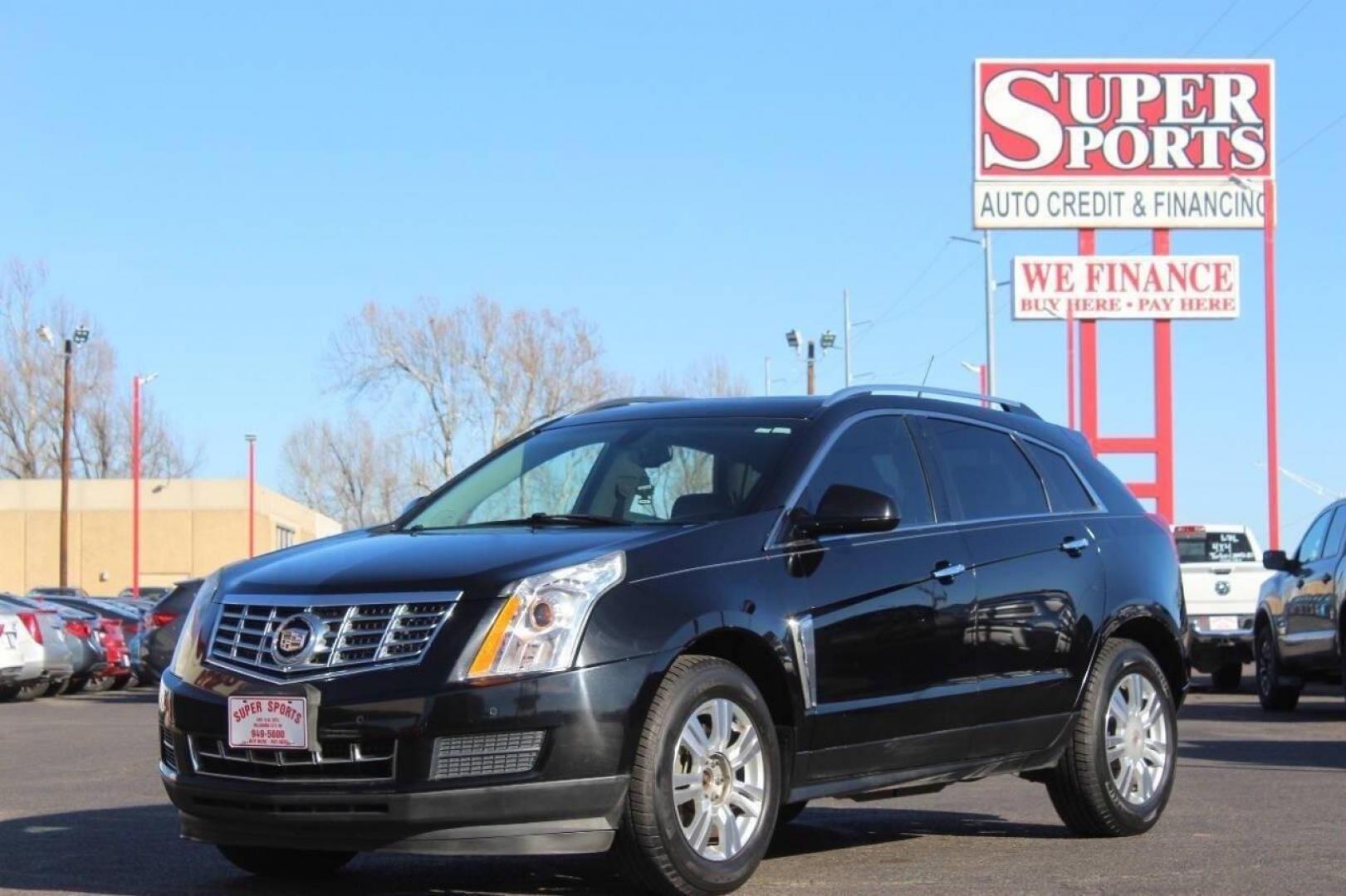 2013 Black Cadillac SRX Premium (3GYFNCE3XDS) with an 3.6L V6 DOHC 24V FFV engine, 6-Speed Automatic transmission, located at 4301 NW 39th , Oklahoma City, OK, 73112, (405) 949-5600, 35.512135, -97.598671 - Photo#7