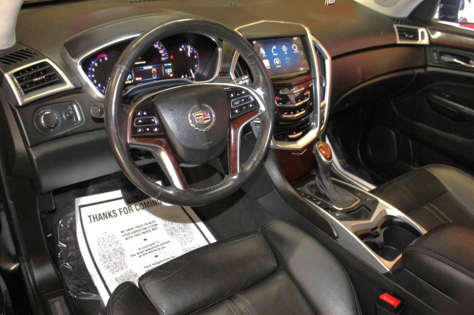 2013 Black Cadillac SRX Premium (3GYFNCE3XDS) with an 3.6L V6 DOHC 24V FFV engine, 6-Speed Automatic transmission, located at 4301 NW 39th , Oklahoma City, OK, 73112, (405) 949-5600, 35.512135, -97.598671 - NO DRIVERS LICENCE NO-FULL COVERAGE INSURANCE-NO CREDIT CHECK. COME ON OVER TO SUPERSPORTS AND TAKE A LOOK AND TEST DRIVE. PLEASE GIVE US A CALL AT (405) 949-5600. NO LICENSIA DE MANEJAR- NO SEGURO DE COBERTURA TOTAL- NO VERIFICACCION DE CREDITO. POR FAVOR VENGAN A SUPERSPORTS, ECHE UN - Photo#16