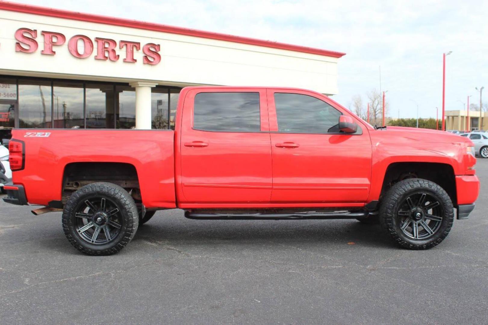 2017 Red Chevrolet Silverado 1500 LT Crew Cab 4WD (3GCUKREC9HG) with an 5.3L V8 OHV 16V engine, 6A transmission, located at 4301 NW 39th , Oklahoma City, OK, 73112, (405) 949-5600, 35.512135, -97.598671 - NO DRIVERS LICENCE NO-FULL COVERAGE INSURANCE-NO CREDIT CHECK. COME ON OVER TO SUPERSPORTS AND TAKE A LOOK AND TEST DRIVE. PLEASE GIVE US A CALL AT (405) 949-5600. NO LICENSIA DE MANEJAR- NO SEGURO DE COBERTURA TOTAL- NO VERIFICACCION DE CREDITO. POR FAVOR VENGAN A SUPERSPORTS, ECHE UN - Photo#3
