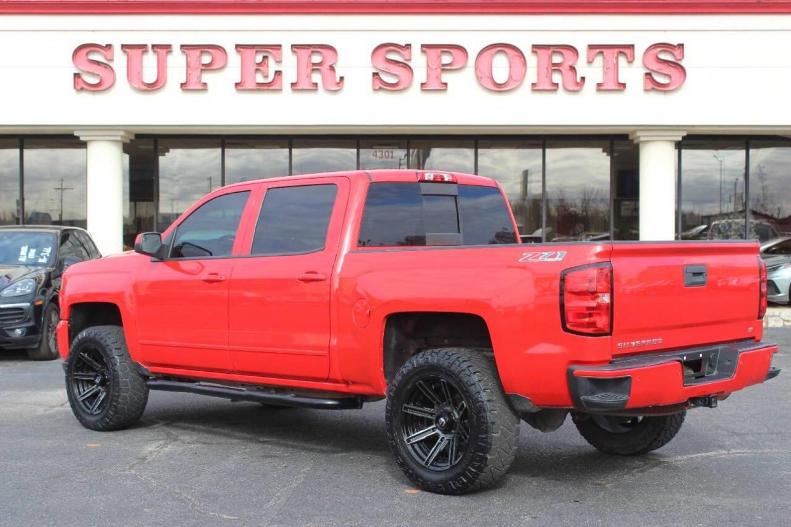 2017 Red Chevrolet Silverado 1500 LT Crew Cab 4WD (3GCUKREC9HG) with an 5.3L V8 OHV 16V engine, 6A transmission, located at 4301 NW 39th , Oklahoma City, OK, 73112, (405) 949-5600, 35.512135, -97.598671 - NO DRIVERS LICENCE NO-FULL COVERAGE INSURANCE-NO CREDIT CHECK. COME ON OVER TO SUPERSPORTS AND TAKE A LOOK AND TEST DRIVE. PLEASE GIVE US A CALL AT (405) 949-5600. NO LICENSIA DE MANEJAR- NO SEGURO DE COBERTURA TOTAL- NO VERIFICACCION DE CREDITO. POR FAVOR VENGAN A SUPERSPORTS, ECHE UN - Photo#6