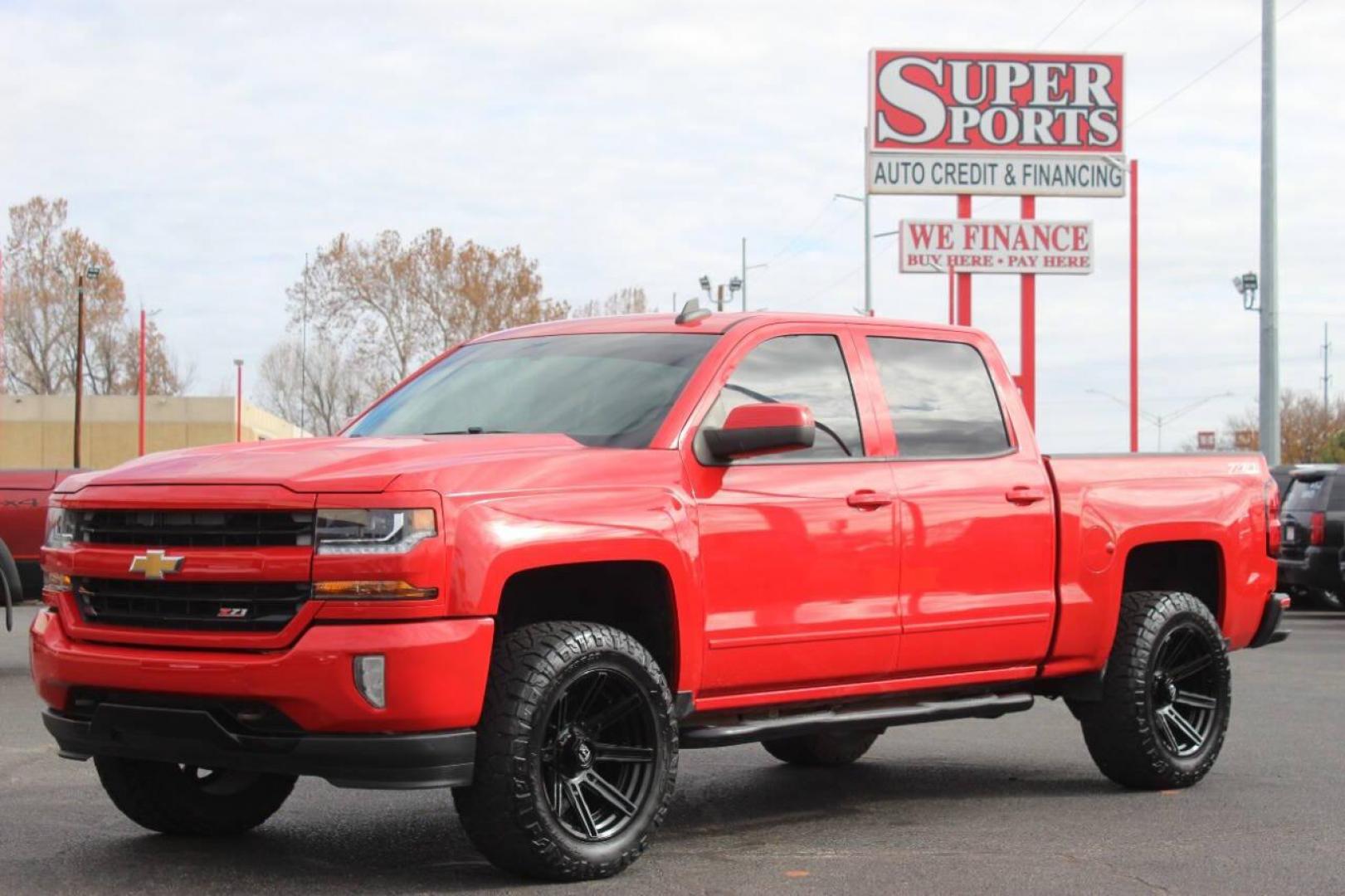 2017 Red Chevrolet Silverado 1500 LT Crew Cab 4WD (3GCUKREC9HG) with an 5.3L V8 OHV 16V engine, 6A transmission, located at 4301 NW 39th , Oklahoma City, OK, 73112, (405) 949-5600, 35.512135, -97.598671 - NO DRIVERS LICENCE NO-FULL COVERAGE INSURANCE-NO CREDIT CHECK. COME ON OVER TO SUPERSPORTS AND TAKE A LOOK AND TEST DRIVE. PLEASE GIVE US A CALL AT (405) 949-5600. NO LICENSIA DE MANEJAR- NO SEGURO DE COBERTURA TOTAL- NO VERIFICACCION DE CREDITO. POR FAVOR VENGAN A SUPERSPORTS, ECHE UN - Photo#8