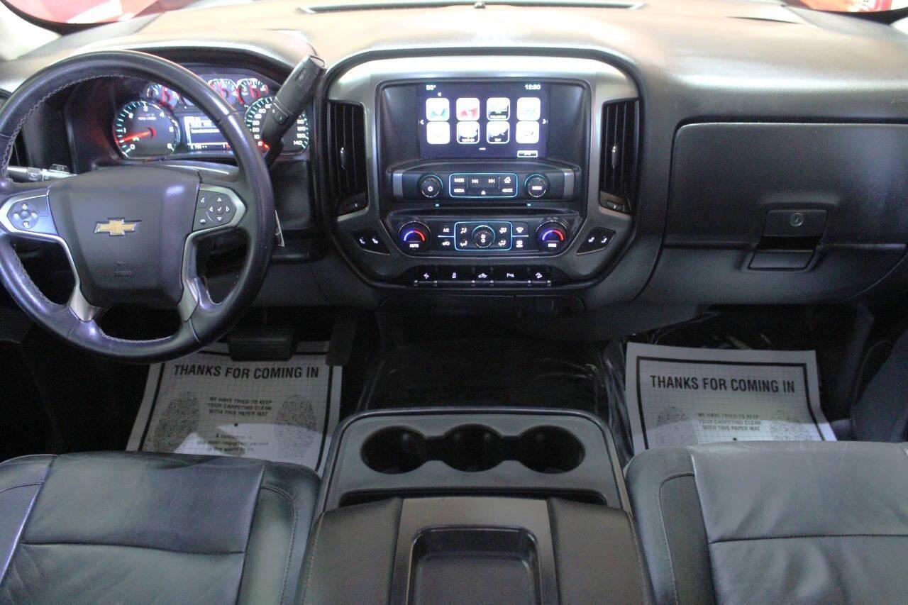 2017 Red Chevrolet Silverado 1500 LT Crew Cab 4WD (3GCUKREC9HG) with an 5.3L V8 5.3L V8 engine, Automatic 6-Speed transmission, located at 4301 NW 39th , Oklahoma City, OK, 73112, (405) 949-5600, 35.512135, -97.598671 - NO DRIVERS LICENCE NO-FULL COVERAGE INSURANCE-NO CREDIT CHECK. COME ON OVER TO SUPERSPORTS AND TAKE A LOOK AND TEST DRIVE. PLEASE GIVE US A CALL AT (405) 949-5600. NO LICENSIA DE MANEJAR- NO SEGURO DE COBERTURA TOTAL- NO VERIFICACCION DE CREDITO. POR FAVOR VENGAN A SUPERSPORTS, ECHE UN - Photo#18