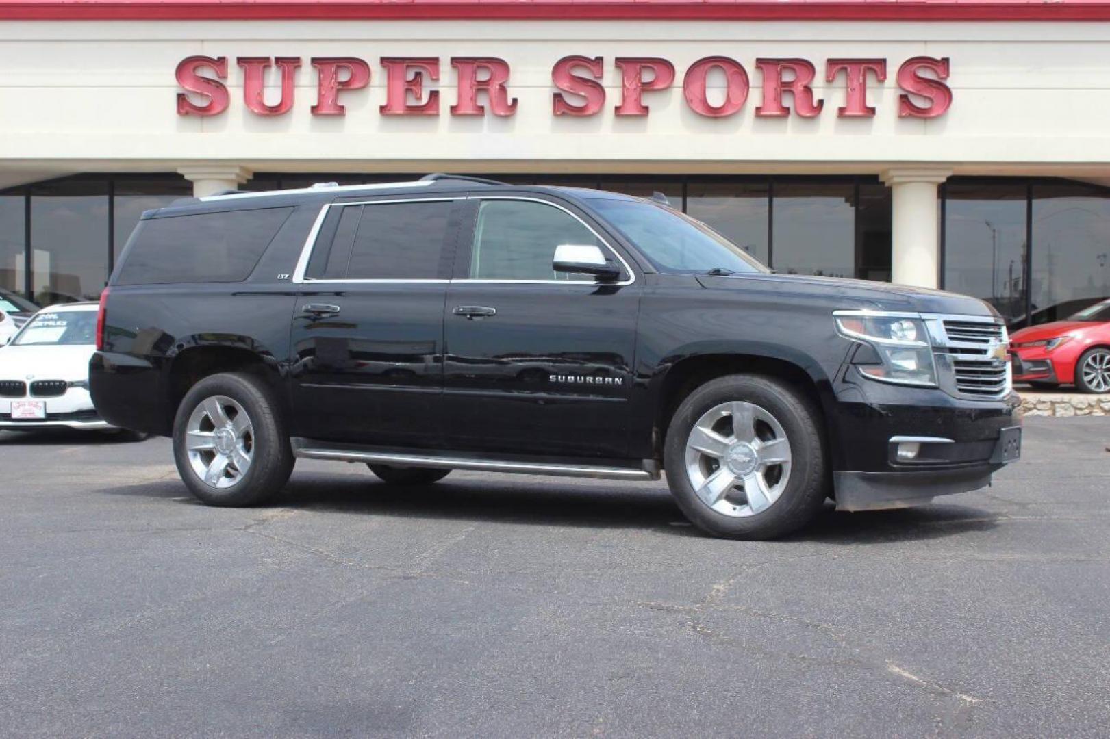 2015 Black Chevrolet Suburban LTZ 1500 4WD (1GNSKKKC3FR) with an 5.3L V8 OHV 16V engine, 6-Speed Automatic transmission, located at 4301 NW 39th , Oklahoma City, OK, 73112, (405) 949-5600, 35.512135, -97.598671 - NO DRIVERS LICENCE NO-FULL COVERAGE INSURANCE-NO CREDIT CHECK. COME ON OVER TO SUPERSPORTS AND TAKE A LOOK AND TEST DRIVE. PLEASE GIVE US A CALL AT (405) 949-5600. NO LICENSIA DE MANEJAR- NO SEGURO DE COBERTURA TOTAL- NO VERIFICACCION DE CREDITO. POR FAVOR VENGAN A SUPERSPORTS, ECHE UN - Photo#2