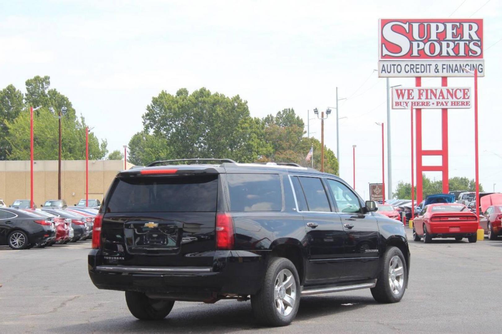 2015 Black Chevrolet Suburban LTZ 1500 4WD (1GNSKKKC3FR) with an 5.3L V8 OHV 16V engine, 6-Speed Automatic transmission, located at 4301 NW 39th , Oklahoma City, OK, 73112, (405) 949-5600, 35.512135, -97.598671 - NO DRIVERS LICENCE -NO FULL COVERAGE INSURANCE - NO CREDIT CHECK. COME ON OVER TO SUPERSPORTS, TAKE A LOOK AND TEST DRIVE. PLEASE GIVE US A CALL AT (405) 949-5600. NO LICENCIA DE CONDUCIR - NO SEGURO DE COBERTURA TOTAL - NO VERIFICACION DE CREDITO. VISITENOS EN SUPERSPORTS, MIRE NUESTRO - Photo#4