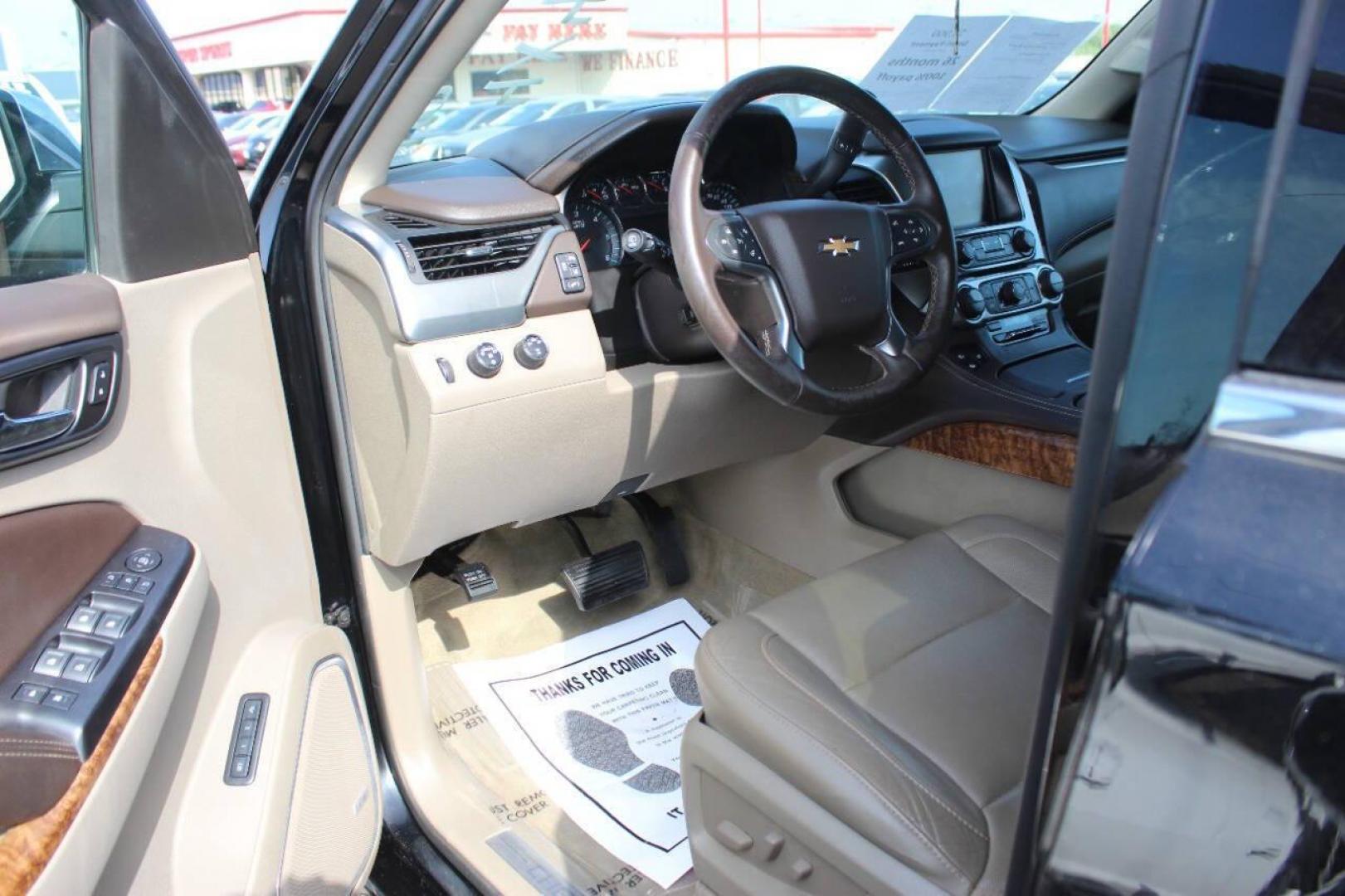 2015 Black Chevrolet Suburban LTZ 1500 4WD (1GNSKKKC3FR) with an 5.3L V8 OHV 16V engine, 6-Speed Automatic transmission, located at 4301 NW 39th , Oklahoma City, OK, 73112, (405) 949-5600, 35.512135, -97.598671 - NO DRIVERS LICENCE NO-FULL COVERAGE INSURANCE-NO CREDIT CHECK. COME ON OVER TO SUPERSPORTS AND TAKE A LOOK AND TEST DRIVE. PLEASE GIVE US A CALL AT (405) 949-5600. NO LICENSIA DE MANEJAR- NO SEGURO DE COBERTURA TOTAL- NO VERIFICACCION DE CREDITO. POR FAVOR VENGAN A SUPERSPORTS, ECHE UN - Photo#18