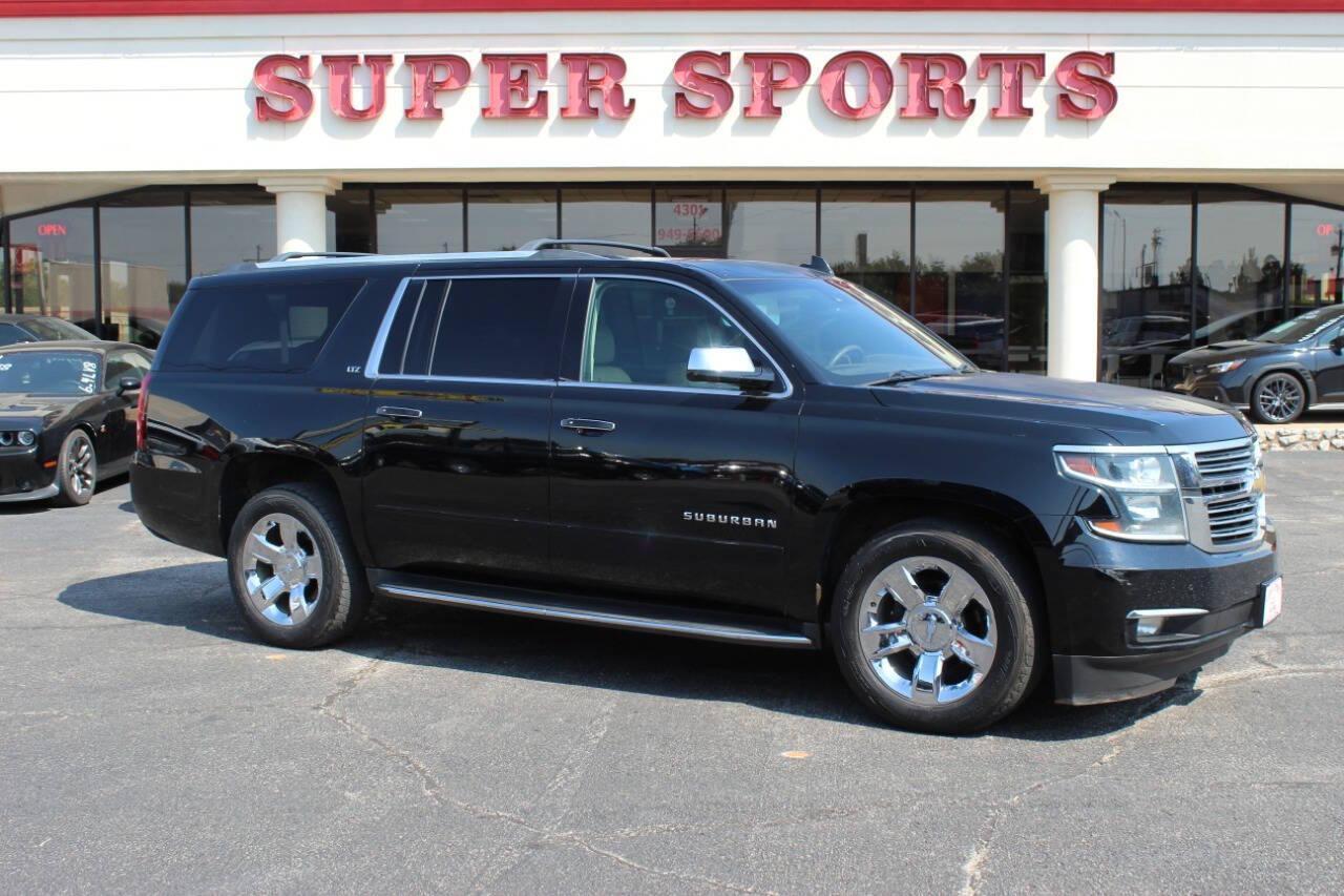 2015 Black Chevrolet Suburban LTZ 1500 4WD (1GNSKKKC3FR) with an 5.3L V8 OHV 16V engine, 6-Speed Automatic transmission, located at 4301 NW 39th , Oklahoma City, OK, 73112, (405) 949-5600, 35.512135, -97.598671 - Photo#0