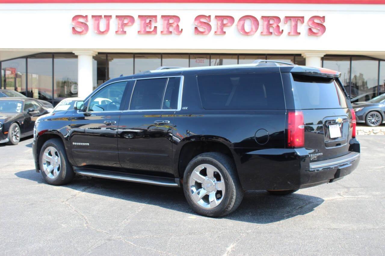 2015 Black Chevrolet Suburban LTZ 1500 4WD (1GNSKKKC3FR) with an 5.3L V8 OHV 16V engine, 6-Speed Automatic transmission, located at 4301 NW 39th , Oklahoma City, OK, 73112, (405) 949-5600, 35.512135, -97.598671 - Photo#4