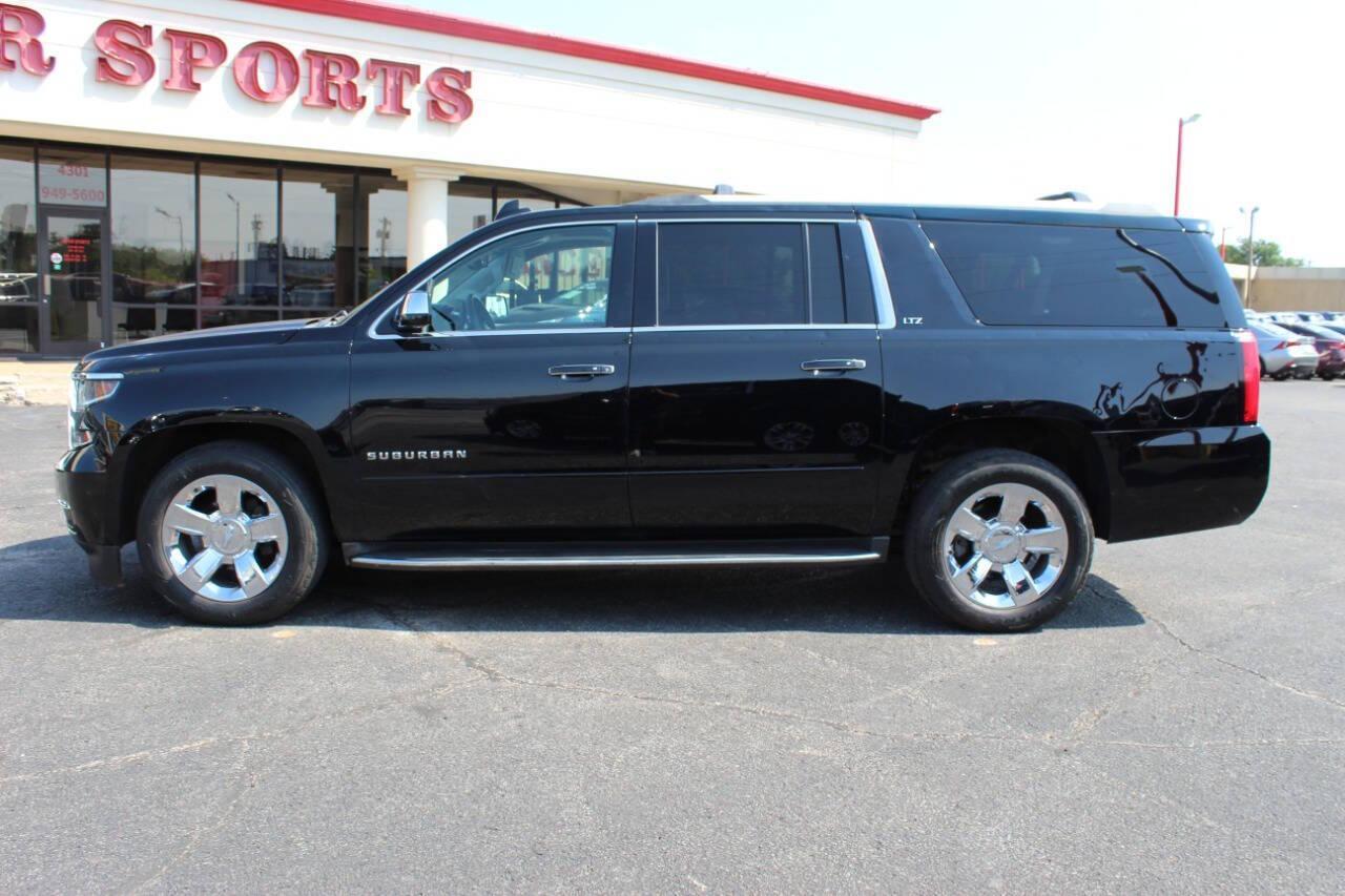 2015 Black Chevrolet Suburban LTZ 1500 4WD (1GNSKKKC3FR) with an 5.3L V8 OHV 16V engine, 6-Speed Automatic transmission, located at 4301 NW 39th , Oklahoma City, OK, 73112, (405) 949-5600, 35.512135, -97.598671 - Photo#5
