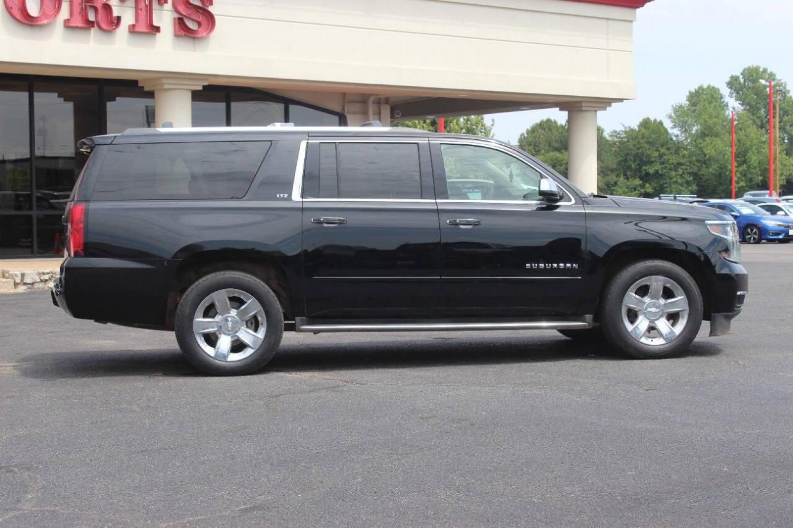 2015 Black Chevrolet Suburban LTZ 1500 4WD (1GNSKKKC3FR) with an 5.3L V8 OHV 16V engine, 6-Speed Automatic transmission, located at 4301 NW 39th , Oklahoma City, OK, 73112, (405) 949-5600, 35.512135, -97.598671 - NO DRIVERS LICENCE NO-FULL COVERAGE INSURANCE-NO CREDIT CHECK. COME ON OVER TO SUPERSPORTS AND TAKE A LOOK AND TEST DRIVE. PLEASE GIVE US A CALL AT (405) 949-5600. NO LICENSIA DE MANEJAR- NO SEGURO DE COBERTURA TOTAL- NO VERIFICACCION DE CREDITO. POR FAVOR VENGAN A SUPERSPORTS, ECHE UN - Photo#4