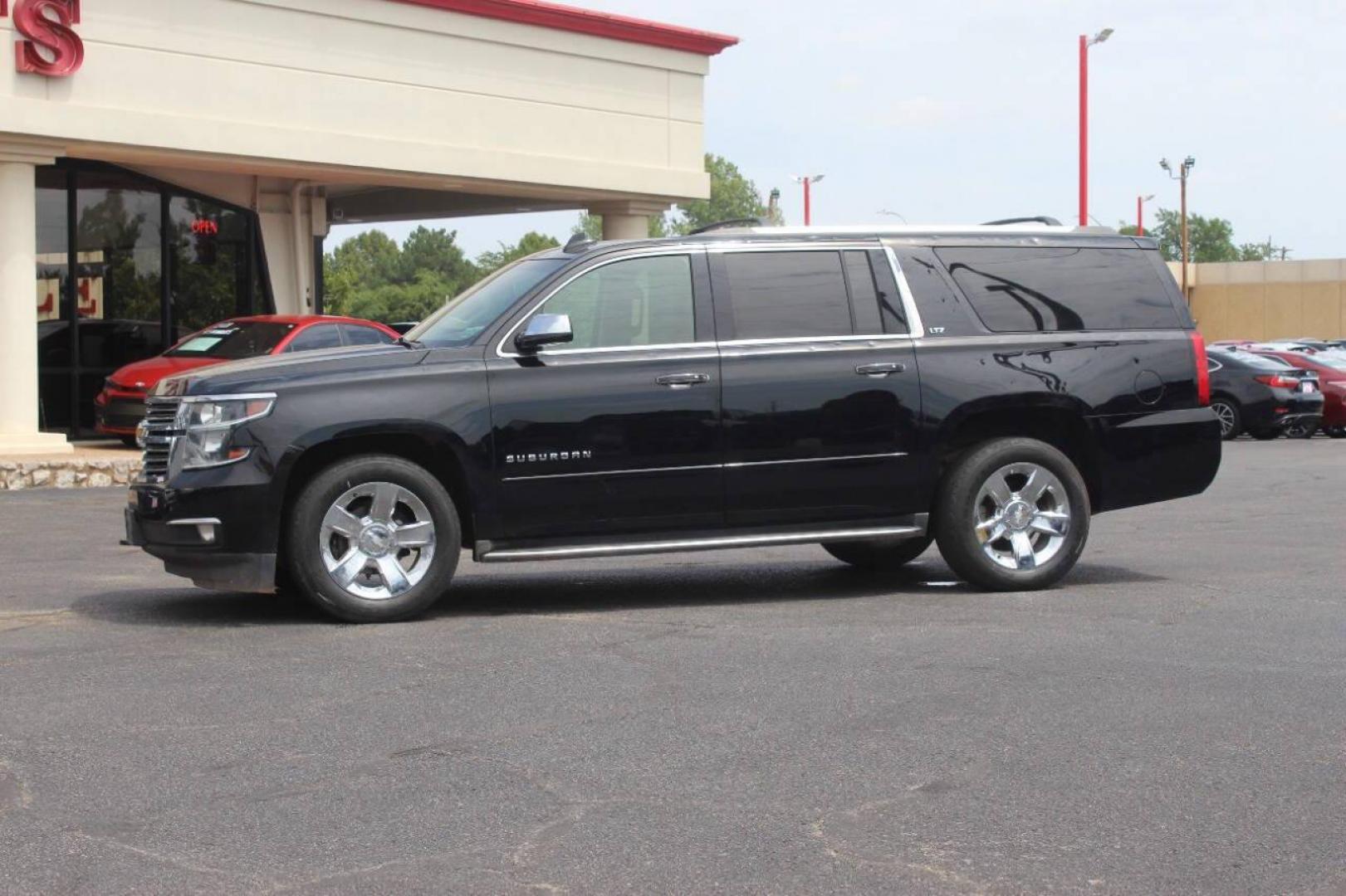 2015 Black Chevrolet Suburban LTZ 1500 4WD (1GNSKKKC3FR) with an 5.3L V8 OHV 16V engine, 6-Speed Automatic transmission, located at 4301 NW 39th , Oklahoma City, OK, 73112, (405) 949-5600, 35.512135, -97.598671 - NO DRIVERS LICENCE NO-FULL COVERAGE INSURANCE-NO CREDIT CHECK. COME ON OVER TO SUPERSPORTS AND TAKE A LOOK AND TEST DRIVE. PLEASE GIVE US A CALL AT (405) 949-5600. NO LICENSIA DE MANEJAR- NO SEGURO DE COBERTURA TOTAL- NO VERIFICACCION DE CREDITO. POR FAVOR VENGAN A SUPERSPORTS, ECHE UN - Photo#6