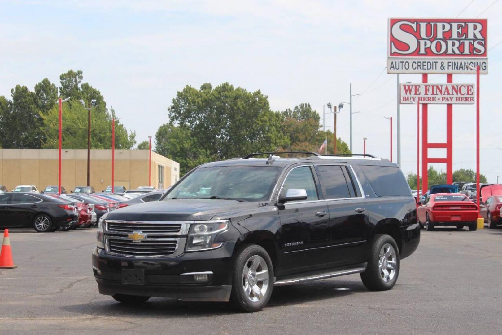 2015 Black Chevrolet Suburban LTZ 1500 4WD (1GNSKKKC3FR) with an 5.3L V8 OHV 16V engine, 6-Speed Automatic transmission, located at 4301 NW 39th , Oklahoma City, OK, 73112, (405) 949-5600, 35.512135, -97.598671 - NO DRIVERS LICENCE NO-FULL COVERAGE INSURANCE-NO CREDIT CHECK. COME ON OVER TO SUPERSPORTS AND TAKE A LOOK AND TEST DRIVE. PLEASE GIVE US A CALL AT (405) 949-5600. NO LICENSIA DE MANEJAR- NO SEGURO DE COBERTURA TOTAL- NO VERIFICACCION DE CREDITO. POR FAVOR VENGAN A SUPERSPORTS, ECHE UN - Photo#7