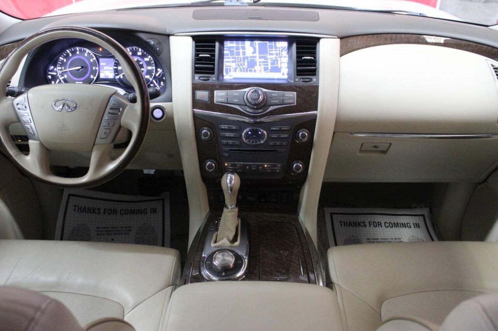 2016 White Infiniti QX80 4WD (JN8AZ2NE0G9) with an 5.6L V8 DOHC 32V engine, 7A transmission, located at 4301 NW 39th , Oklahoma City, OK, 73112, (405) 949-5600, 35.512135, -97.598671 - NO DRIVERS LICENSE - NO FULL COVERAGE INSURANCE NO CREDIT CHECK. COME ON OVER TO SUPERSPORTS AND TAKE A LOOK AND TEST DRIVE. PLEASE GIVE US A CALL AT (405) 949-5600. NO LICENCIA DE MANEJAR - NO SEGURO DE COBERTURA TOTAL - NO VERIFICACION DE CREDITO. POR FAVOR VENGAN A SUPERSPORTS, ECHE - Photo#20