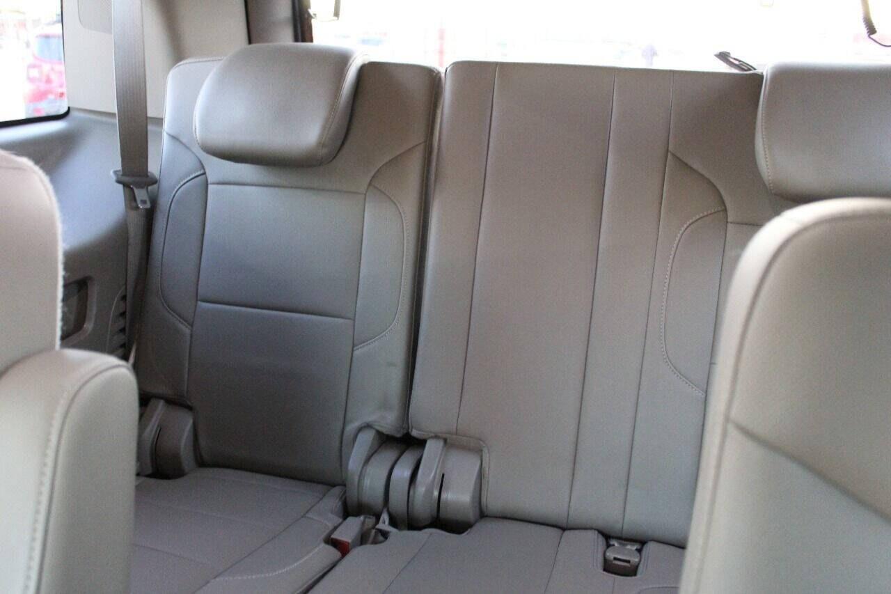 2015 Pewter Chevrolet Tahoe LTZ 4WD (1GNSKCKC6FR) with an 5.3L V8 5.3L V8 engine, Automatic 6-Speed transmission, located at 4301 NW 39th , Oklahoma City, OK, 73112, (405) 949-5600, 35.512135, -97.598671 - Hablamos espaol. SPEND SMART --- BUY FROM SUPER SPORTS. ASKING WHOLESALE CASH PRICE: $13,900 (CASH ONLY) PLUS $100 PROCESSING FEE. ALL PRICES, DOWN PAYMENTS, PAYMENTS, AND FINANCE TERMS ARE NEGOTIABLE AT THE TIME OF APPROVAL. WE WILL WORK WITH YOU TO FIT YOUR BUDGET. WE WILL EVEN LOW- Photo#20