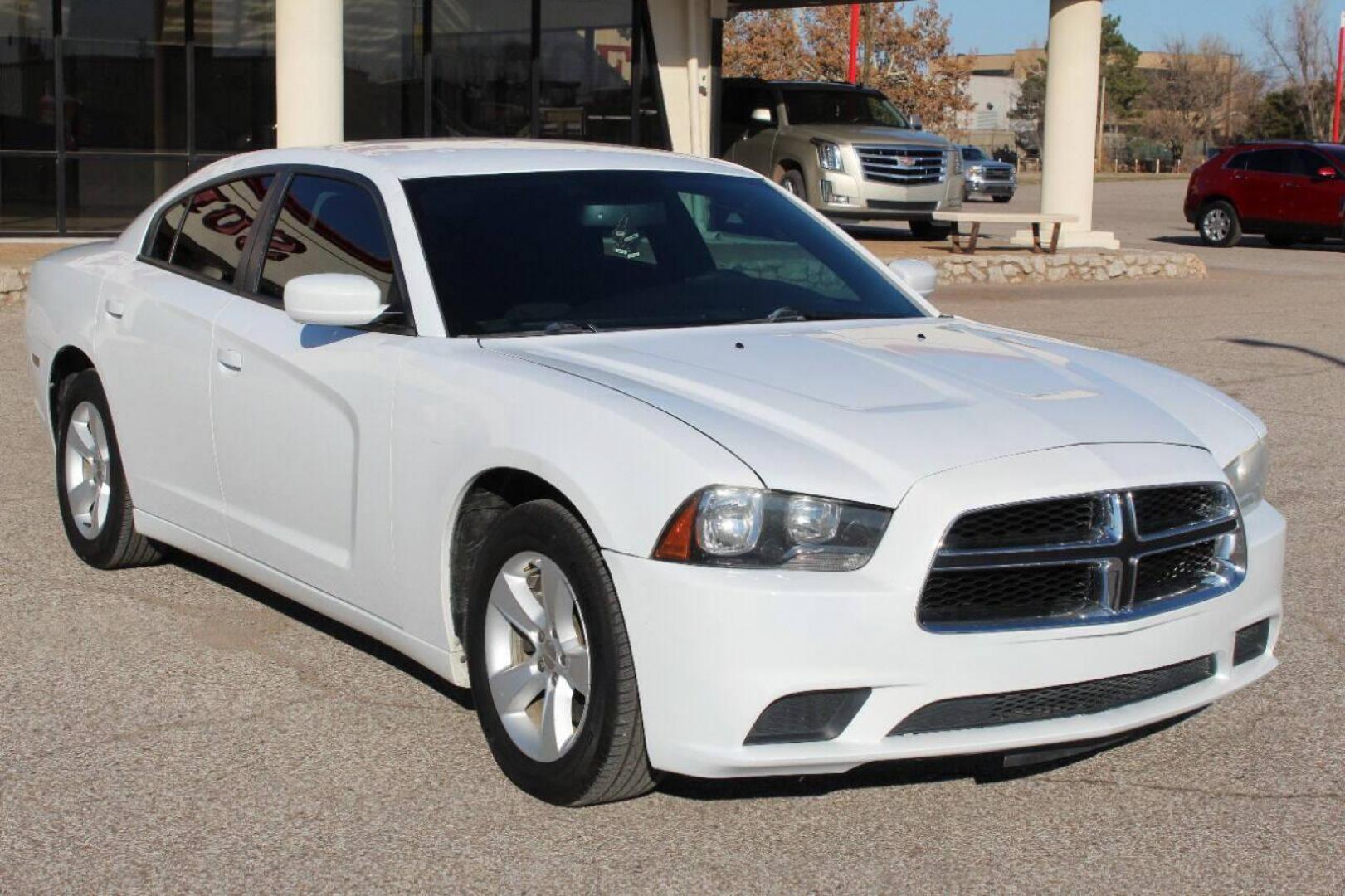 2013 White Dodge Charger SE (2C3CDXBG5DH) with an 3.6L V6 DOHC 24V engine, 5-Speed Automatic transmission, located at 4301 NW 39th , Oklahoma City, OK, 73112, (405) 949-5600, 35.512135, -97.598671 - NO DRIVERS LICENCE NO-FULL COVERAGE INSURANCE-NO CREDIT CHECK. COME ON OVER TO SUPERSPORTS AND TAKE A LOOK AND TEST DRIVE PLEASE GIVE US A CALL AT (405) 949-5600. NO LICENSIA DE MANEJAR- NO SEGURO DE COBERTURA TOTAL- NO VERIFICACCION DE CREDITO. POR FAVOR VENGAN A SUPERSPORTS, ECHE - Photo#2