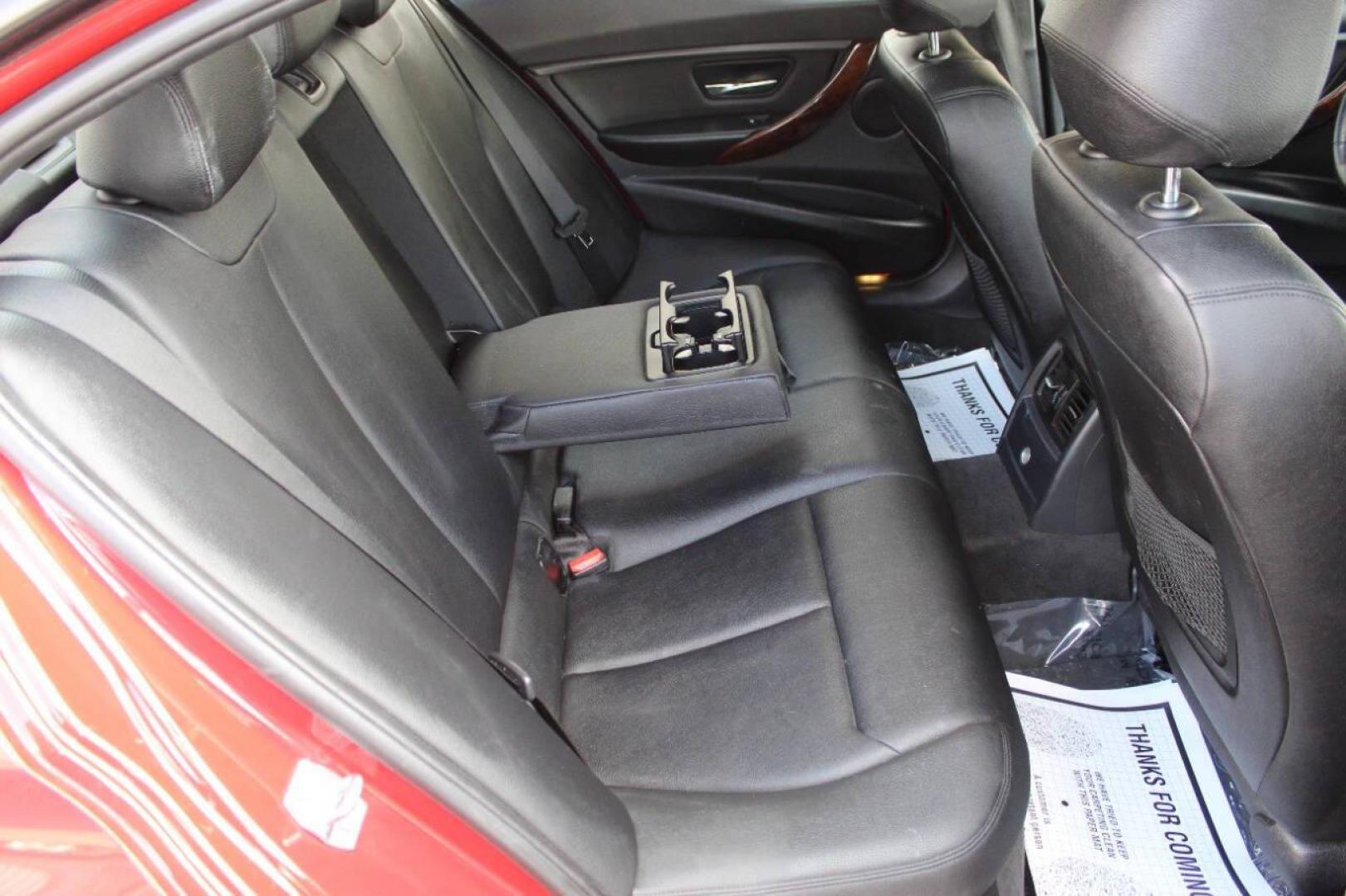 2013 Red BMW 3-Series 328i xDrive Sedan (WBA3B3G56DN) with an 2.0L L4 DOHC 16V engine, Automatic 8-Speed transmission, located at 4301 NW 39th , Oklahoma City, OK, 73112, (405) 949-5600, 35.512135, -97.598671 - NO DRIVERS LICENCE NO-FULL COVERAGE INSURANCE-NO CREDIT CHECK. COME ON OVER TO SUPERSPORTS AND TAKE A LOOK AND TEST DRIVE. PLEASE GIVE US A CALL AT (405) 949-5600. NO LICENSIA DE MANEJAR- NO SEGURO DE COBERTURA TOTAL- NO VERIFICACCION DE CREDITO. POR FAVOR VENGAN A SUPERSPORTS, ECHE UN - Photo#10
