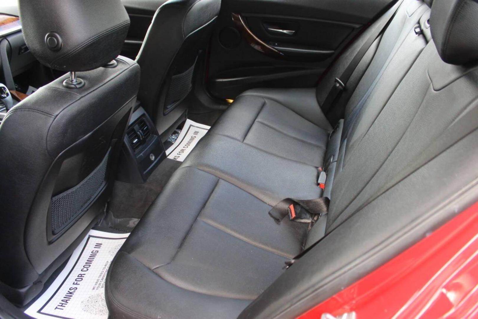 2013 Red BMW 3-Series 328i xDrive Sedan (WBA3B3G56DN) with an 2.0L L4 DOHC 16V engine, Automatic 8-Speed transmission, located at 4301 NW 39th , Oklahoma City, OK, 73112, (405) 949-5600, 35.512135, -97.598671 - NO DRIVERS LICENCE NO-FULL COVERAGE INSURANCE-NO CREDIT CHECK. COME ON OVER TO SUPERSPORTS AND TAKE A LOOK AND TEST DRIVE. PLEASE GIVE US A CALL AT (405) 949-5600. NO LICENSIA DE MANEJAR- NO SEGURO DE COBERTURA TOTAL- NO VERIFICACCION DE CREDITO. POR FAVOR VENGAN A SUPERSPORTS, ECHE UN - Photo#13