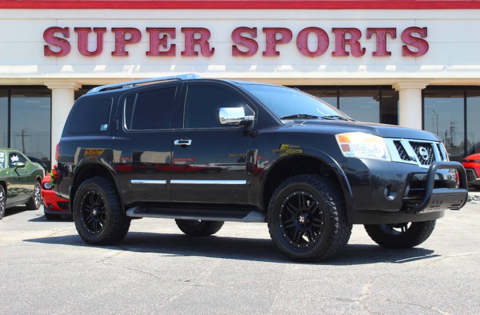 2013 Black Nissan Armada Platinum 4WD (5N1AA0NEXDN) with an 5.6L V8 5.6L V8 engine, Automatic 5-Speed transmission, located at 4301 NW 39th , Oklahoma City, OK, 73112, (405) 949-5600, 35.512135, -97.598671- Photo#0