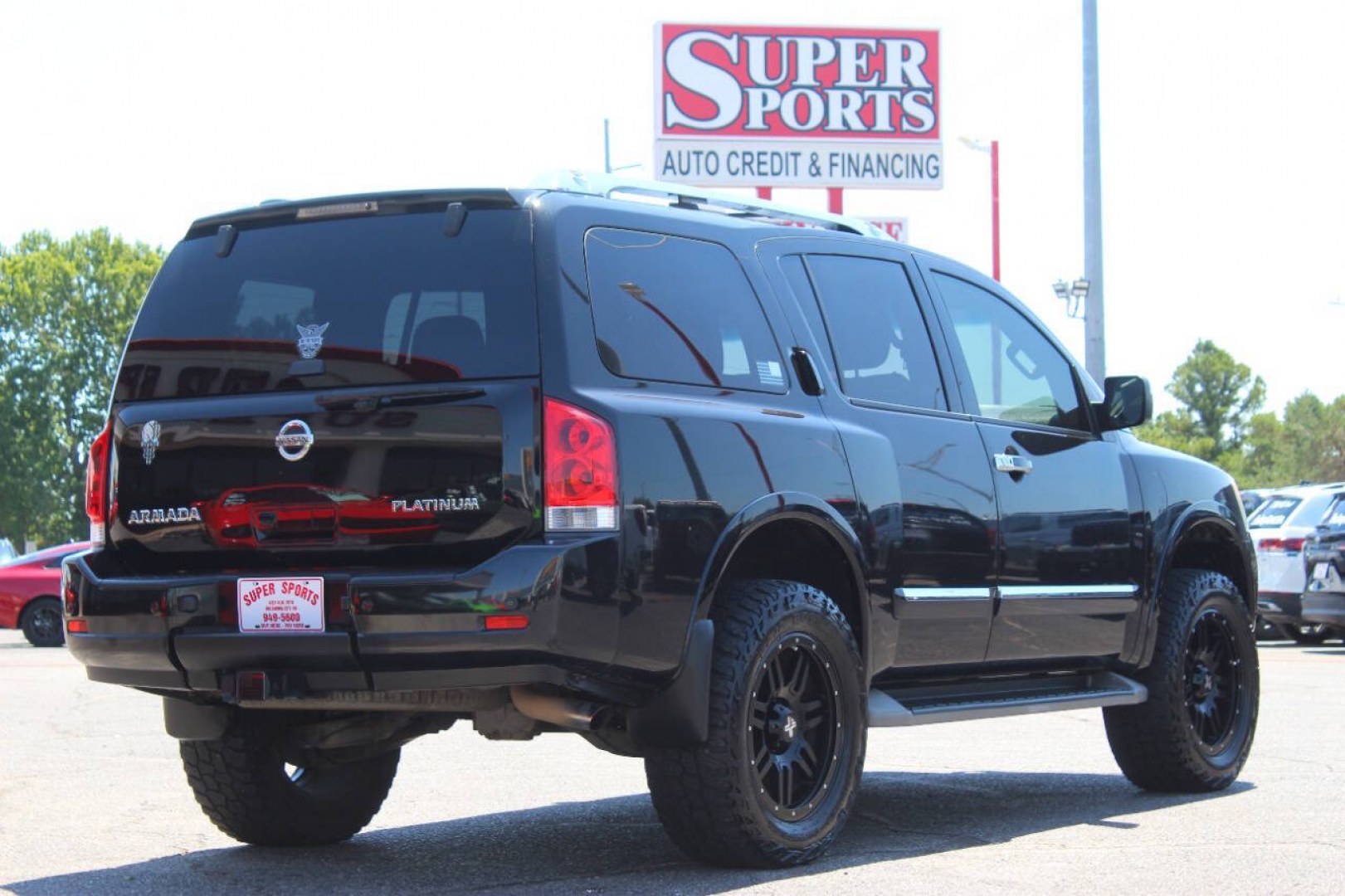 2013 Black Nissan Armada Platinum 4WD (5N1AA0NEXDN) with an 5.6L V8 5.6L V8 engine, Automatic 5-Speed transmission, located at 4301 NW 39th , Oklahoma City, OK, 73112, (405) 949-5600, 35.512135, -97.598671- Photo#2