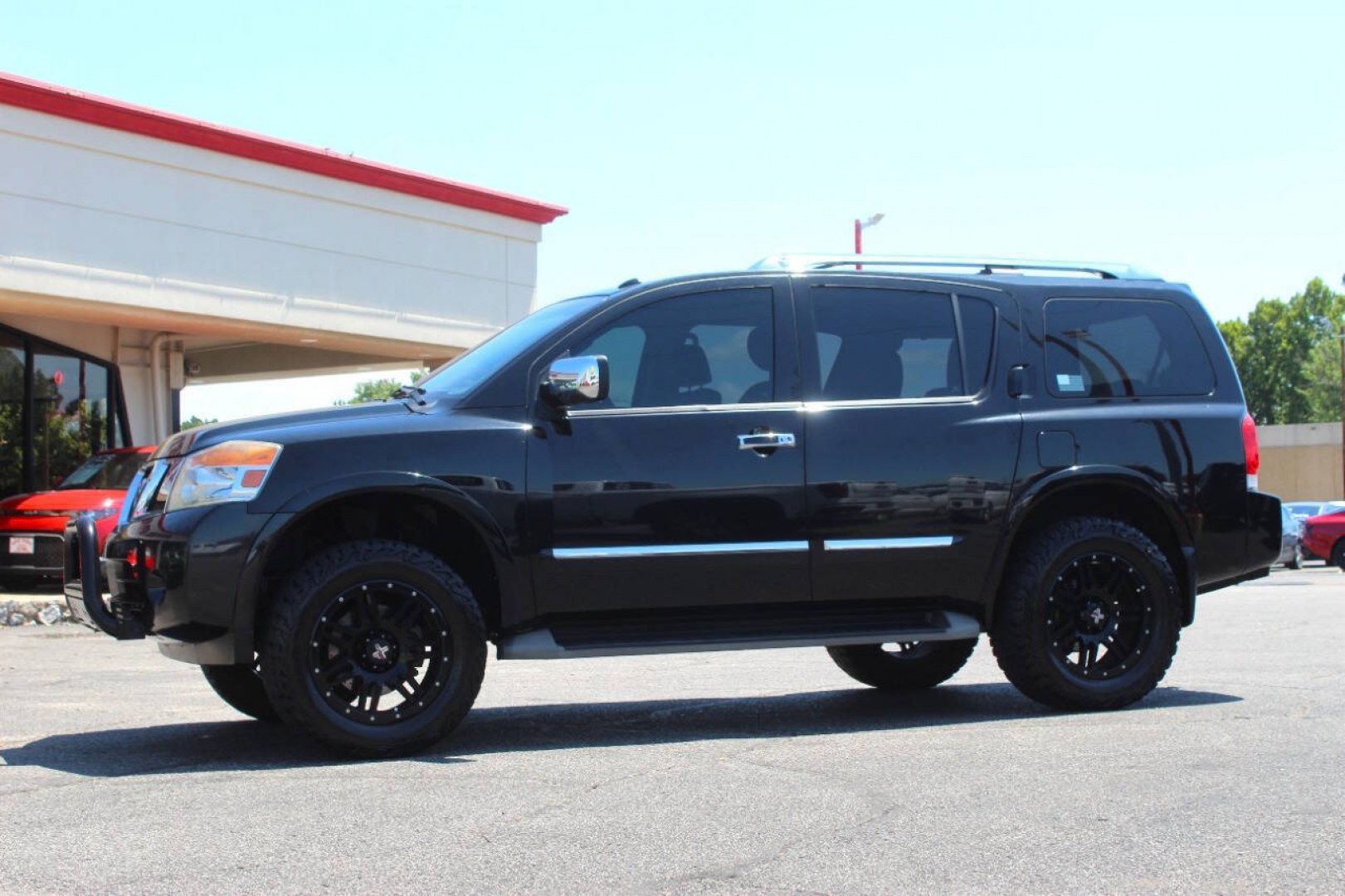 2013 Black Nissan Armada Platinum 4WD (5N1AA0NEXDN) with an 5.6L V8 5.6L V8 engine, Automatic 5-Speed transmission, located at 4301 NW 39th , Oklahoma City, OK, 73112, (405) 949-5600, 35.512135, -97.598671- Photo#5