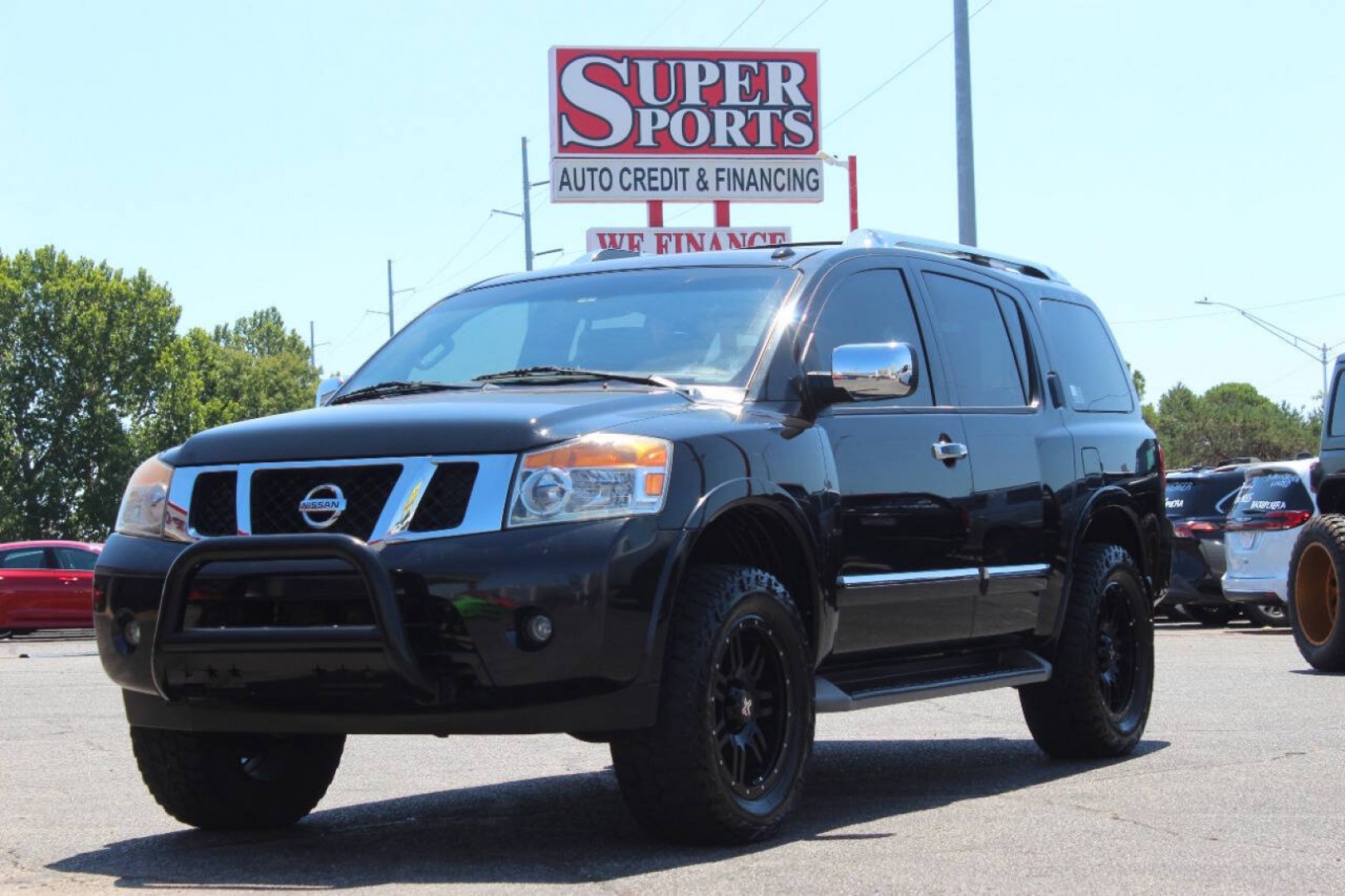 2013 Black Nissan Armada Platinum 4WD (5N1AA0NEXDN) with an 5.6L V8 5.6L V8 engine, Automatic 5-Speed transmission, located at 4301 NW 39th , Oklahoma City, OK, 73112, (405) 949-5600, 35.512135, -97.598671- Photo#6