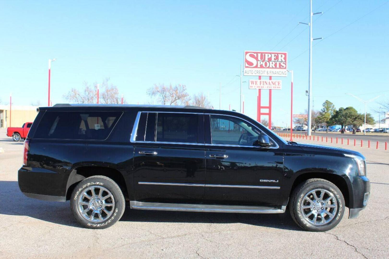 2015 Black GMC Yukon Denali XL 4WD (1GKS2JKJ5FR) with an 6.2L V8 OHV 16V engine, 6-Speed Automatic transmission, located at 4301 NW 39th , Oklahoma City, OK, 73112, (405) 949-5600, 35.512135, -97.598671 - NO DRIVERS LICENCE NO-FULL COVERAGE INSURANCE-NO CREDIT CHECK. COME ON OVER TO SUPERSPORTS AND TAKE A LOOK AND TEST DRIVE. PLEASE GIVE US A CALL AT (405) 949-5600. NO LICENSIA DE MANEJAR- NO SEGURO DE COBERTURA TOTAL- NO VERIFICACION DE CREDITO. POR FAVOR VENGAN A SUPERSPORTS, ECHE UN V - Photo#2
