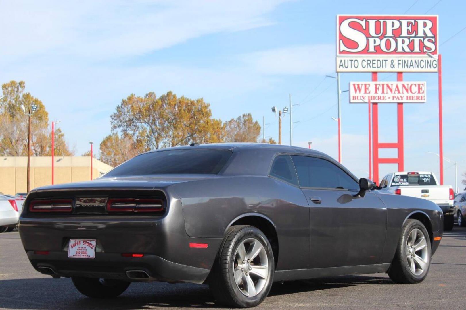 2015 Gray Dodge Challenger SXT (2C3CDZAG8FH) with an 3.6L V6 DOHC 24V engine, 5-Speed Automatic transmission, located at 4301 NW 39th , Oklahoma City, OK, 73112, (405) 949-5600, 35.512135, -97.598671 - NO DRIVERS LICENCE NO-FULL COVERAGE INSURANCE-NO CREDIT CHECK. COME ON OVER TO SUPERSPORTS AND TAKE A LOOK AND TEST DRIVE. PLEASE GIVE US A CALL AT (405) 949-5600. NO LICENSIA DE MANEJAR- NO SEGURO DE COBERTURA TOTAL- NO VERIFICACCION DE CREDITO. POR FAVOR VENGAN A SUPERSPORTS, ECHE UN - Photo#4