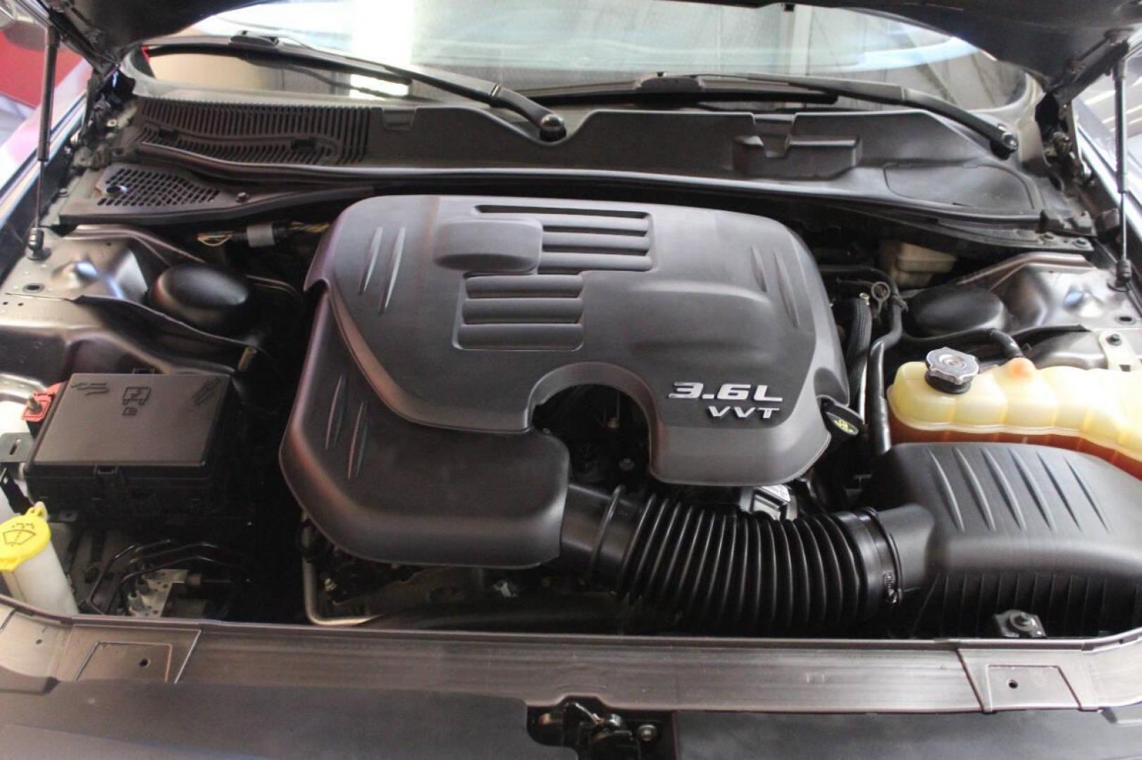 2015 Gray Dodge Challenger SXT (2C3CDZAG8FH) with an 3.6L V6 DOHC 24V engine, 5-Speed Automatic transmission, located at 4301 NW 39th , Oklahoma City, OK, 73112, (405) 949-5600, 35.512135, -97.598671 - NO DRIVERS LICENCE NO-FULL COVERAGE INSURANCE-NO CREDIT CHECK. COME ON OVER TO SUPERSPORTS AND TAKE A LOOK AND TEST DRIVE. PLEASE GIVE US A CALL AT (405) 949-5600. NO LICENSIA DE MANEJAR- NO SEGURO DE COBERTURA TOTAL- NO VERIFICACCION DE CREDITO. POR FAVOR VENGAN A SUPERSPORTS, ECHE UN - Photo#6
