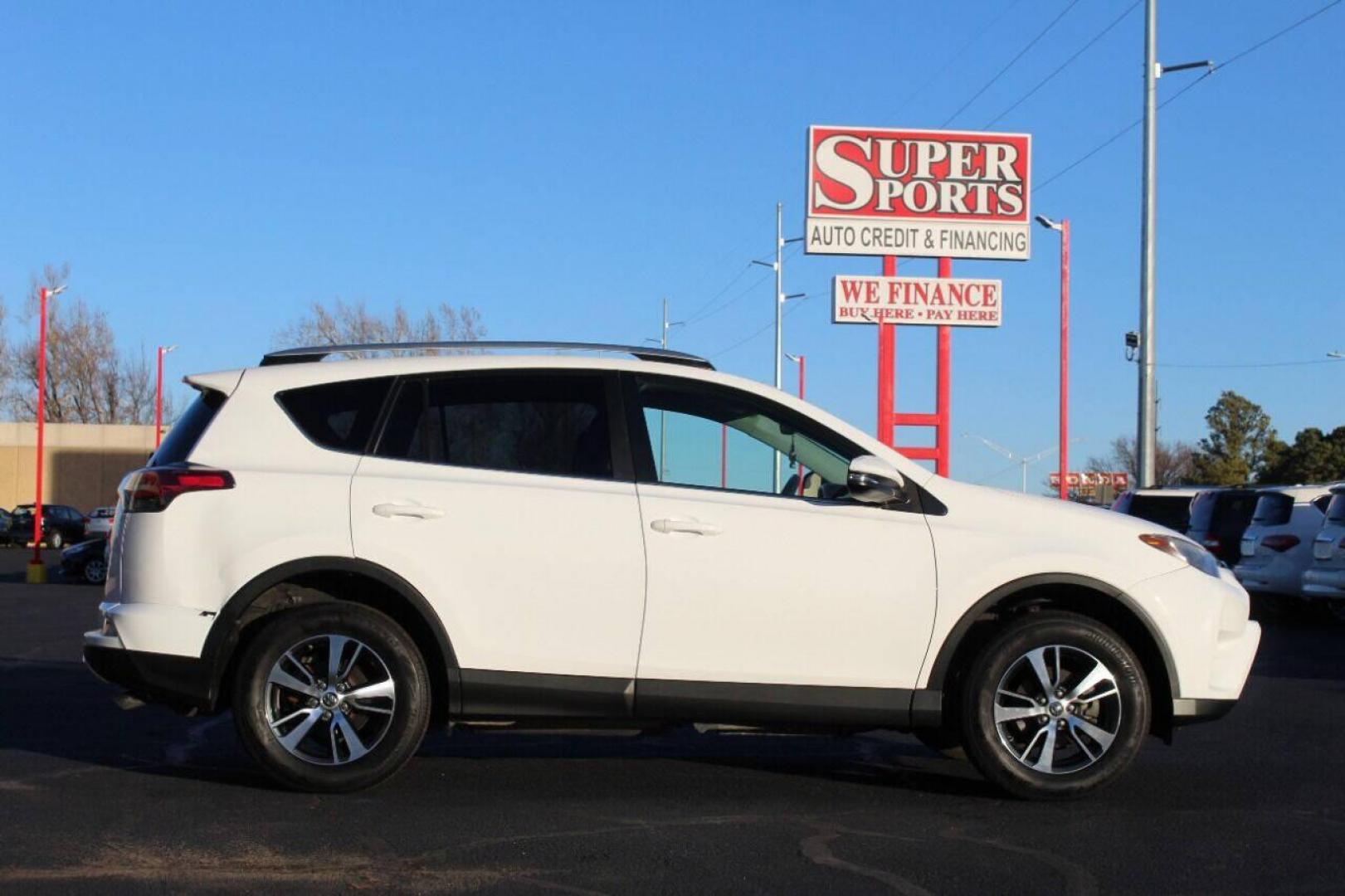2016 White Toyota RAV4 XLE AWD (2T3RFREV1GW) with an 2.5L L4 DOHC 16V engine, 6A transmission, located at 4301 NW 39th , Oklahoma City, OK, 73112, (405) 949-5600, 35.512135, -97.598671 - NO DRIVERS LICENSE - NO FULL COVERAGE INSURANCE - NO CREDIT CHECK. COME ON OVER TO SUPERSPORTS AND TAKE A LOOK AND TEST DRIVE. PLEASE GIVE US A CALL AT (405) 949-5600. NO LICENCIA DE MANEJAR - NO SEGURO DE COBERTURA TOTAL - NO VERIFICACION DE CREDITO. POR FAVOR VENGAN A SUPERSPORTS, ECH - Photo#4