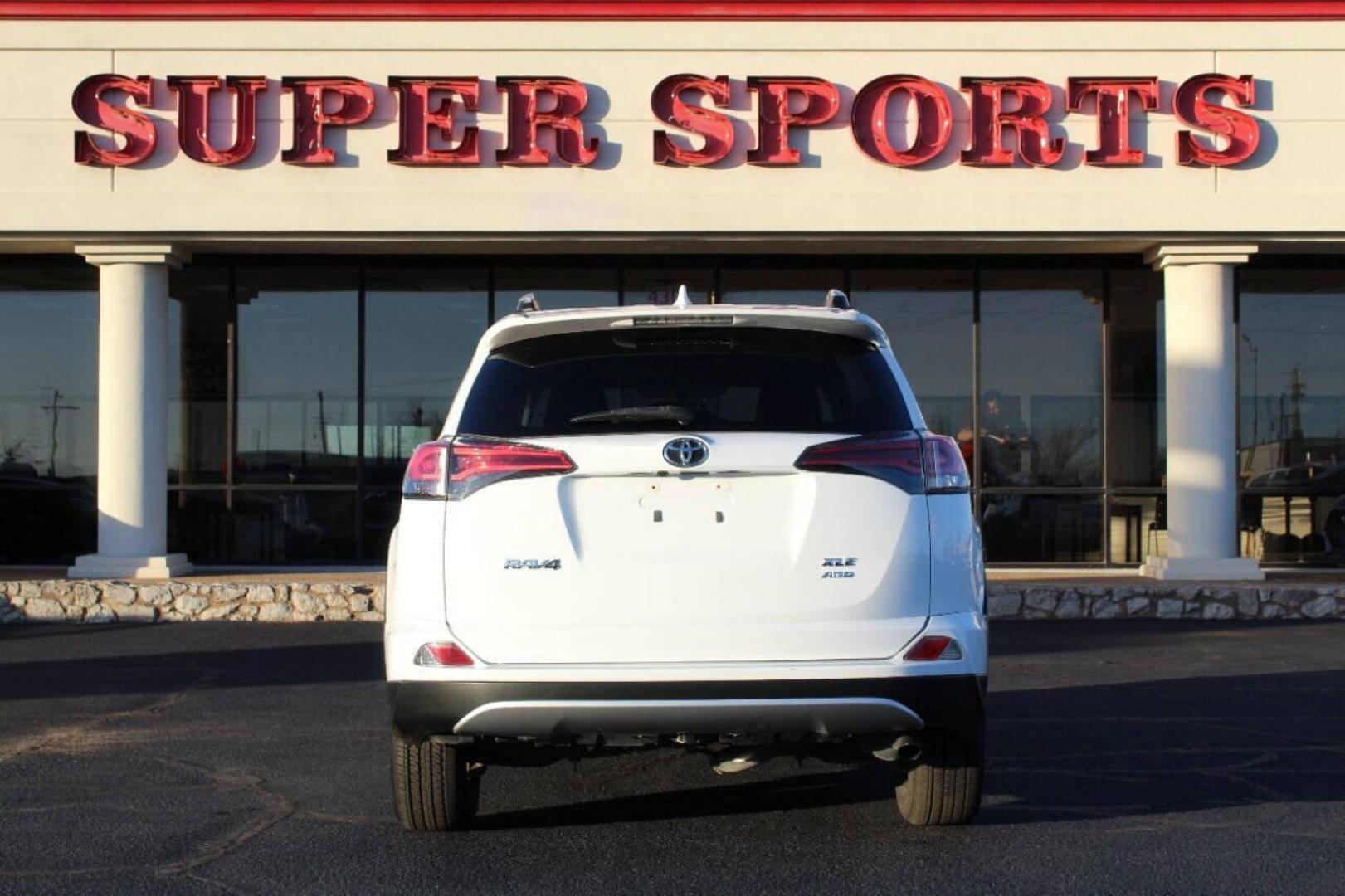 2016 White Toyota RAV4 XLE AWD (2T3RFREV1GW) with an 2.5L L4 DOHC 16V engine, 6A transmission, located at 4301 NW 39th , Oklahoma City, OK, 73112, (405) 949-5600, 35.512135, -97.598671 - NO DRIVERS LICENSE - NO FULL COVERAGE INSURANCE - NO CREDIT CHECK. COME ON OVER TO SUPERSPORTS AND TAKE A LOOK AND TEST DRIVE. PLEASE GIVE US A CALL AT (405) 949-5600. NO LICENCIA DE MANEJAR - NO SEGURO DE COBERTURA TOTAL - NO VERIFICACION DE CREDITO. POR FAVOR VENGAN A SUPERSPORTS, ECH - Photo#5