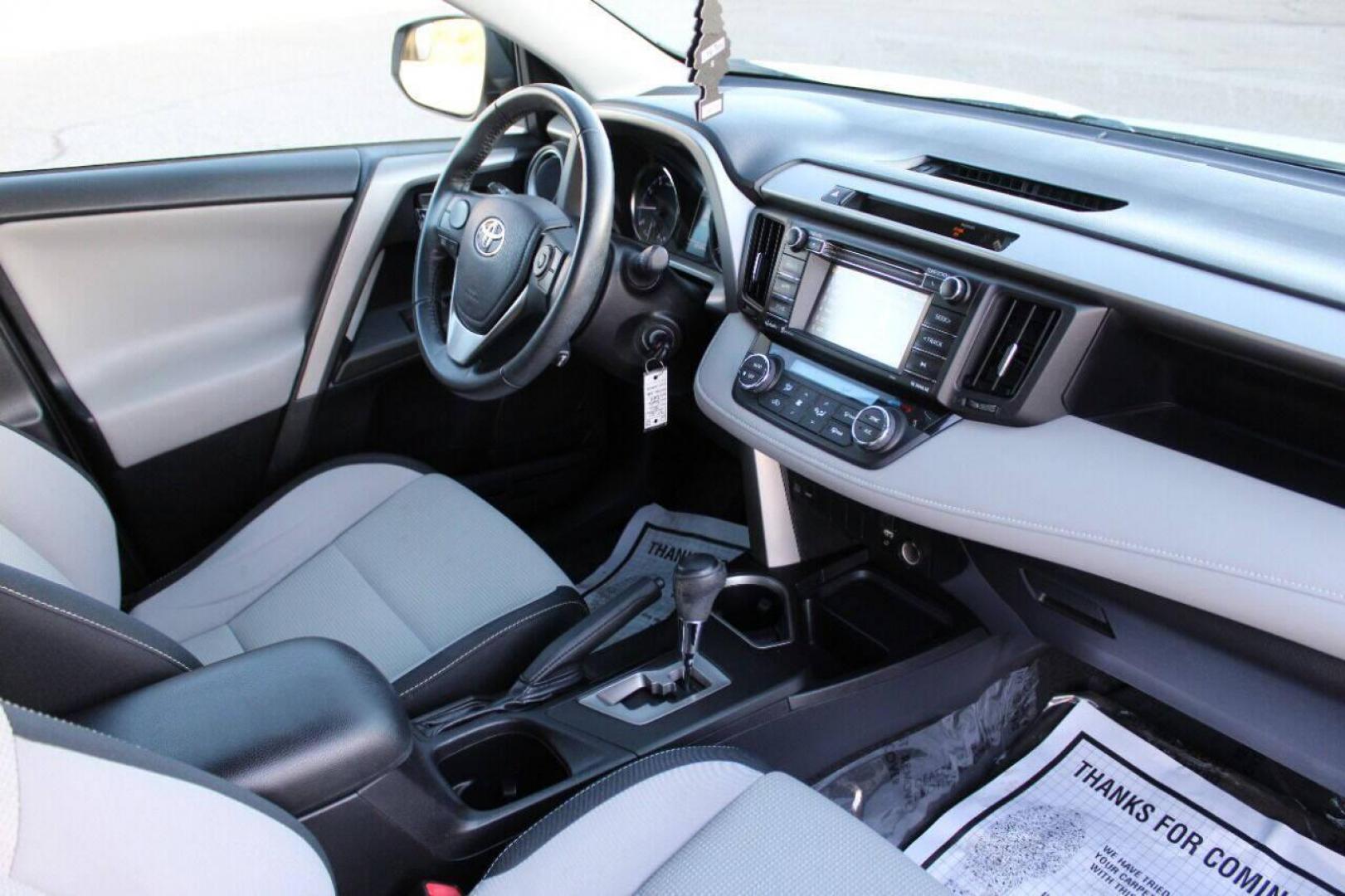 2016 White Toyota RAV4 XLE AWD (2T3RFREV1GW) with an 2.5L L4 DOHC 16V engine, 6A transmission, located at 4301 NW 39th , Oklahoma City, OK, 73112, (405) 949-5600, 35.512135, -97.598671 - NO DRIVERS LICENSE - NO FULL COVERAGE INSURANCE - NO CREDIT CHECK. COME ON OVER TO SUPERSPORTS AND TAKE A LOOK AND TEST DRIVE. PLEASE GIVE US A CALL AT (405) 949-5600. NO LICENCIA DE MANEJAR - NO SEGURO DE COBERTURA TOTAL - NO VERIFICACION DE CREDITO. POR FAVOR VENGAN A SUPERSPORTS, ECH - Photo#10