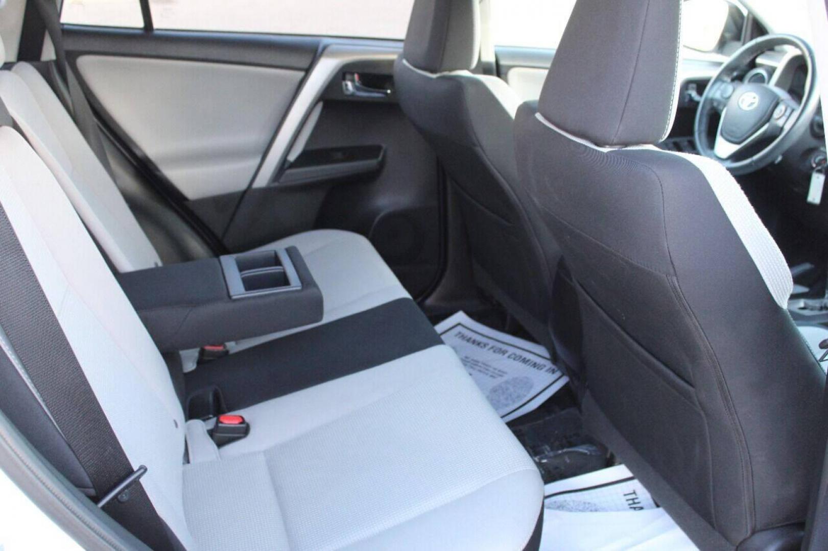 2016 White Toyota RAV4 XLE AWD (2T3RFREV1GW) with an 2.5L L4 DOHC 16V engine, 6A transmission, located at 4301 NW 39th , Oklahoma City, OK, 73112, (405) 949-5600, 35.512135, -97.598671 - NO DRIVERS LICENSE - NO FULL COVERAGE INSURANCE - NO CREDIT CHECK. COME ON OVER TO SUPERSPORTS AND TAKE A LOOK AND TEST DRIVE. PLEASE GIVE US A CALL AT (405) 949-5600. NO LICENCIA DE MANEJAR - NO SEGURO DE COBERTURA TOTAL - NO VERIFICACION DE CREDITO. POR FAVOR VENGAN A SUPERSPORTS, ECH - Photo#15