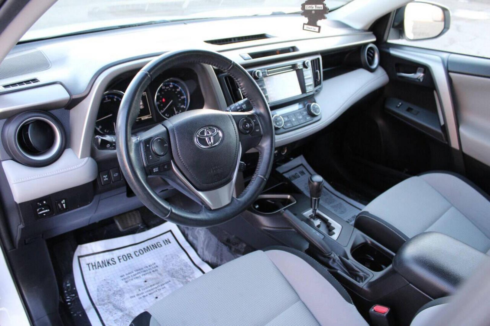 2016 White Toyota RAV4 XLE AWD (2T3RFREV1GW) with an 2.5L L4 DOHC 16V engine, 6A transmission, located at 4301 NW 39th , Oklahoma City, OK, 73112, (405) 949-5600, 35.512135, -97.598671 - NO DRIVERS LICENSE - NO FULL COVERAGE INSURANCE - NO CREDIT CHECK. COME ON OVER TO SUPERSPORTS AND TAKE A LOOK AND TEST DRIVE. PLEASE GIVE US A CALL AT (405) 949-5600. NO LICENCIA DE MANEJAR - NO SEGURO DE COBERTURA TOTAL - NO VERIFICACION DE CREDITO. POR FAVOR VENGAN A SUPERSPORTS, ECH - Photo#17