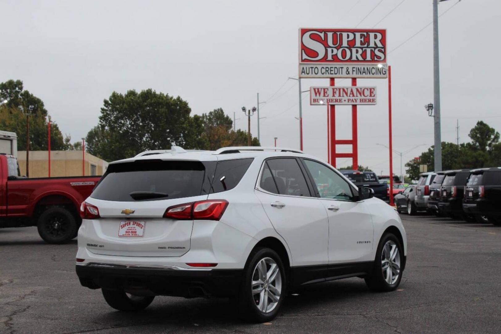2019 White Chevrolet Equinox Premier 2.0 AWD (2GNAXYEX2K6) with an 2.0L L4 DOHC 16V engine, 9A transmission, located at 4301 NW 39th , Oklahoma City, OK, 73112, (405) 949-5600, 35.512135, -97.598671 - NO DRIVERS LICENSE - NO FULL COVERAGE INSURANCE - NO CREDIT CHECK. COME ON OVER TO SUPERSPORTS AND TAKE A LOOK AND TEST DRIVE PLEASE GIVE US A CALL AT (405) 949-5600. NO LICENCIA DE MANEJAR - NO SEGURO DE COBERTURA TOTAL - NO VERIFICACION DE CREDITO. POR FAVOR VENGAN A SUPERSPOR - Photo#3