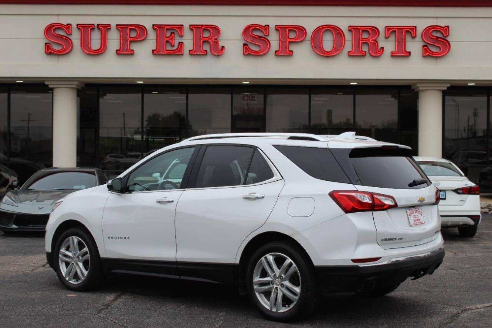 2019 White Chevrolet Equinox Premier 2.0 AWD (2GNAXYEX2K6) with an 2.0L L4 DOHC 16V engine, 9A transmission, located at 4301 NW 39th , Oklahoma City, OK, 73112, (405) 949-5600, 35.512135, -97.598671 - NO DRIVERS LICENSE - NO FULL COVERAGE INSURANCE - NO CREDIT CHECK. COME ON OVER TO SUPERSPORTS AND TAKE A LOOK AND TEST DRIVE PLEASE GIVE US A CALL AT (405) 949-5600. NO LICENCIA DE MANEJAR - NO SEGURO DE COBERTURA TOTAL - NO VERIFICACION DE CREDITO. POR FAVOR VENGAN A SUPERSPOR - Photo#4