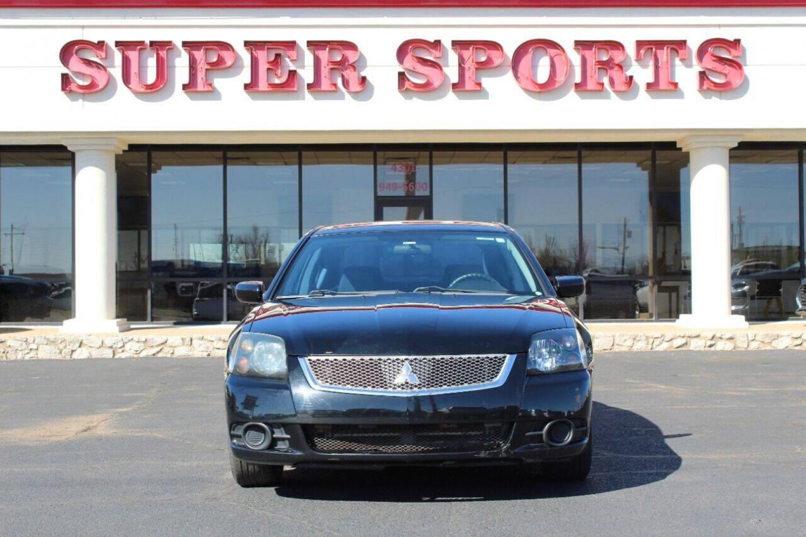 2011 Black Mitsubishi Galant FE (4A32B2FF1BE) with an 2.4L L4 SOHC 16V engine, 4-Speed Automatic transmission, located at 4301 NW 39th , Oklahoma City, OK, 73112, (405) 949-5600, 35.512135, -97.598671 - NO DRIVERS LICENCE NO-FULL COVERAGE INSURANCE-NO CREDIT CHECK. COME ON OVER TO SUPERSPORTS AND TAKE A LOOK AND TEST DRIVE PLEASE GIVE US A CALL AT (405) 949-5600. NO LICENSIA DE MANEJAR- NO SEGURO DE COBERTURA TOTAL- NO VERIFICACCION DE CREDITO. POR FAVOR VENGAN A SUPERSPORTS, E - Photo#2