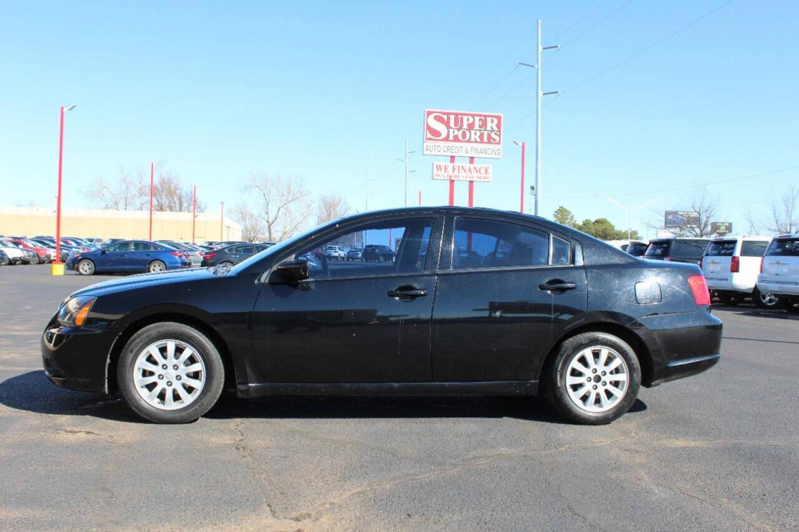 2011 Black Mitsubishi Galant FE (4A32B2FF1BE) with an 2.4L L4 SOHC 16V engine, 4-Speed Automatic transmission, located at 4301 NW 39th , Oklahoma City, OK, 73112, (405) 949-5600, 35.512135, -97.598671 - NO DRIVERS LICENCE NO-FULL COVERAGE INSURANCE-NO CREDIT CHECK. COME ON OVER TO SUPERSPORTS AND TAKE A LOOK AND TEST DRIVE PLEASE GIVE US A CALL AT (405) 949-5600. NO LICENSIA DE MANEJAR- NO SEGURO DE COBERTURA TOTAL- NO VERIFICACCION DE CREDITO. POR FAVOR VENGAN A SUPERSPORTS, E - Photo#4