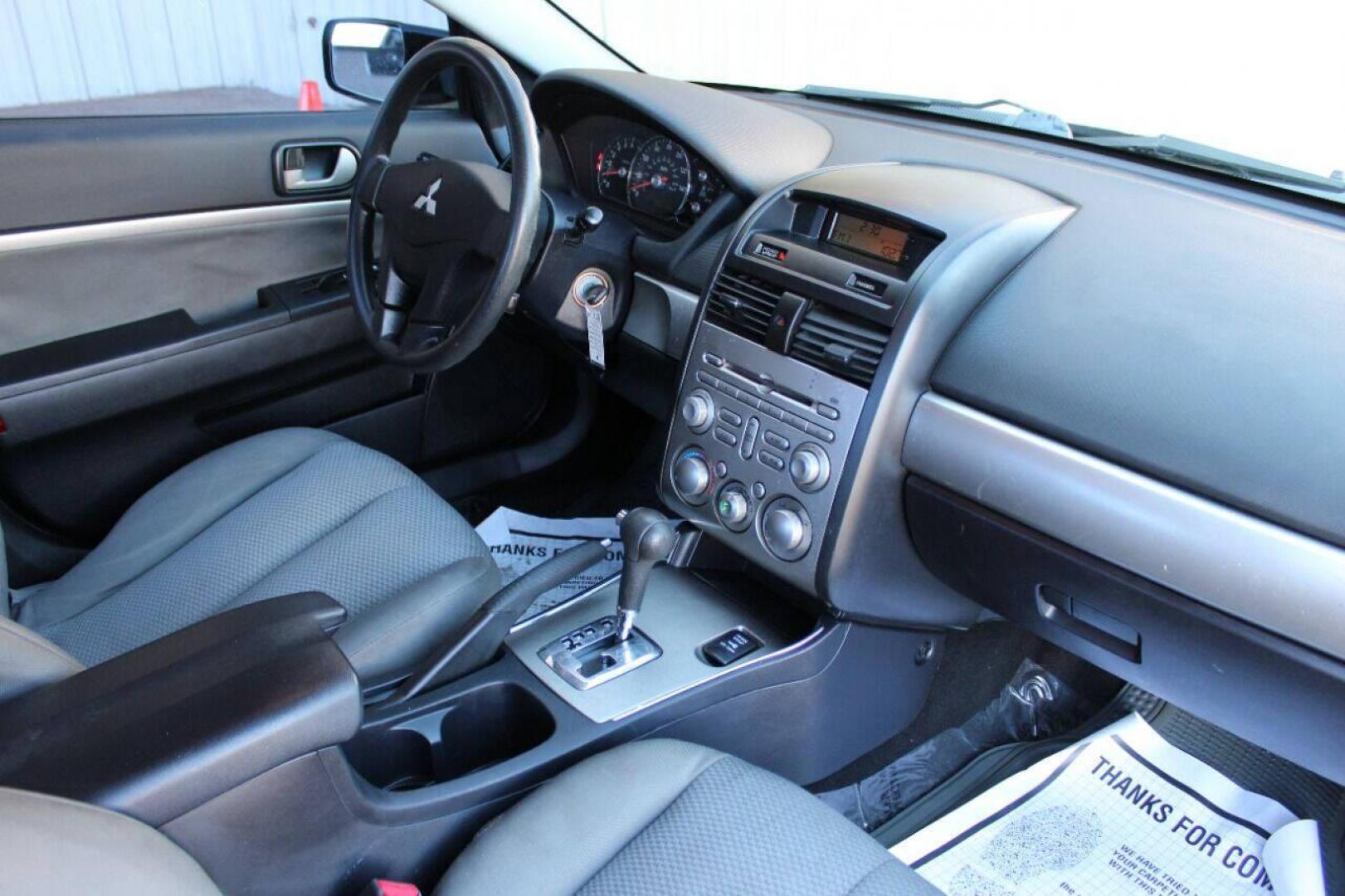 2011 Black Mitsubishi Galant FE (4A32B2FF1BE) with an 2.4L L4 SOHC 16V engine, 4-Speed Automatic transmission, located at 4301 NW 39th , Oklahoma City, OK, 73112, (405) 949-5600, 35.512135, -97.598671 - NO DRIVERS LICENCE NO-FULL COVERAGE INSURANCE-NO CREDIT CHECK. COME ON OVER TO SUPERSPORTS AND TAKE A LOOK AND TEST DRIVE PLEASE GIVE US A CALL AT (405) 949-5600. NO LICENSIA DE MANEJAR- NO SEGURO DE COBERTURA TOTAL- NO VERIFICACCION DE CREDITO. POR FAVOR VENGAN A SUPERSPORTS, E - Photo#6