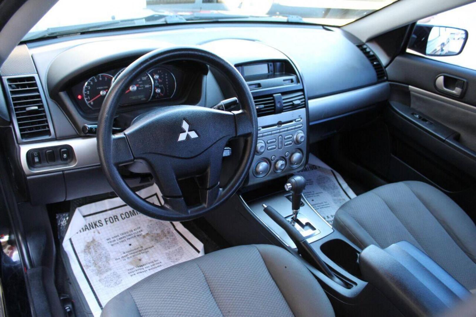 2011 Black Mitsubishi Galant FE (4A32B2FF1BE) with an 2.4L L4 SOHC 16V engine, 4-Speed Automatic transmission, located at 4301 NW 39th , Oklahoma City, OK, 73112, (405) 949-5600, 35.512135, -97.598671 - NO DRIVERS LICENCE NO-FULL COVERAGE INSURANCE-NO CREDIT CHECK. COME ON OVER TO SUPERSPORTS AND TAKE A LOOK AND TEST DRIVE PLEASE GIVE US A CALL AT (405) 949-5600. NO LICENSIA DE MANEJAR- NO SEGURO DE COBERTURA TOTAL- NO VERIFICACCION DE CREDITO. POR FAVOR VENGAN A SUPERSPORTS, E - Photo#8