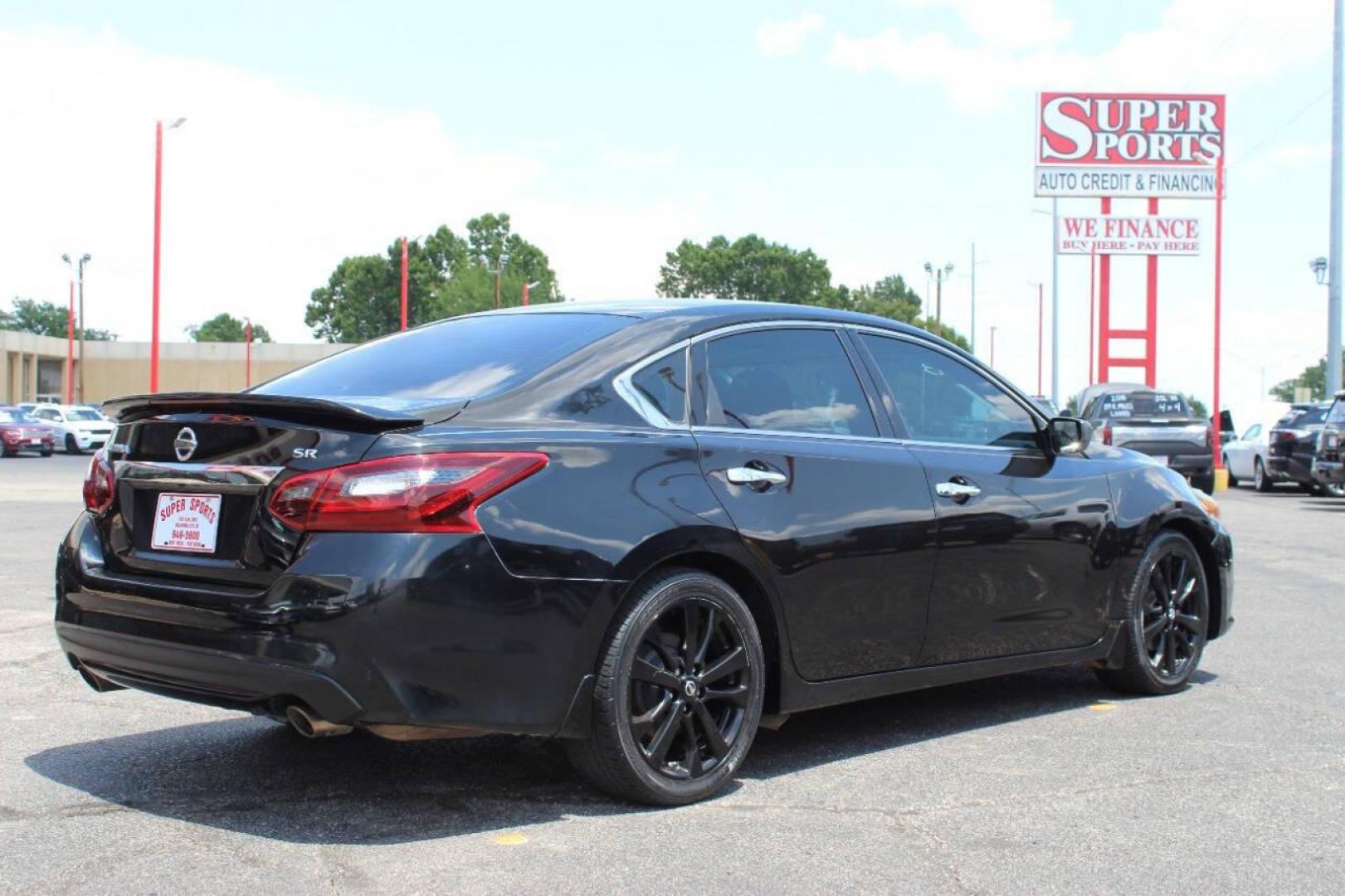 2017 Black Nissan Altima 2.5 S (1N4AL3AP3HC) with an 2.5L L4 DOHC 16V engine, CVT transmission, located at 4301 NW 39th , Oklahoma City, OK, 73112, (405) 949-5600, 35.512135, -97.598671 - NO DRIVERS LICENCE NO-FULL COVERAGE INSURANCE-NO CREDIT CHECK. COME ON OVER TO SUPERSPORTS AND TAKE A LOOK AND TEST DRIVE PLEASE GIVE US A CALL AT (405) 949-5600. NO LICENSIA DE MANEJAR- NO SEGURO DE COBERTURA TOTAL- NO VERIFICACCION DE CREDITO. POR FAVOR VENGAN A SUPERSPORTS, E - Photo#4