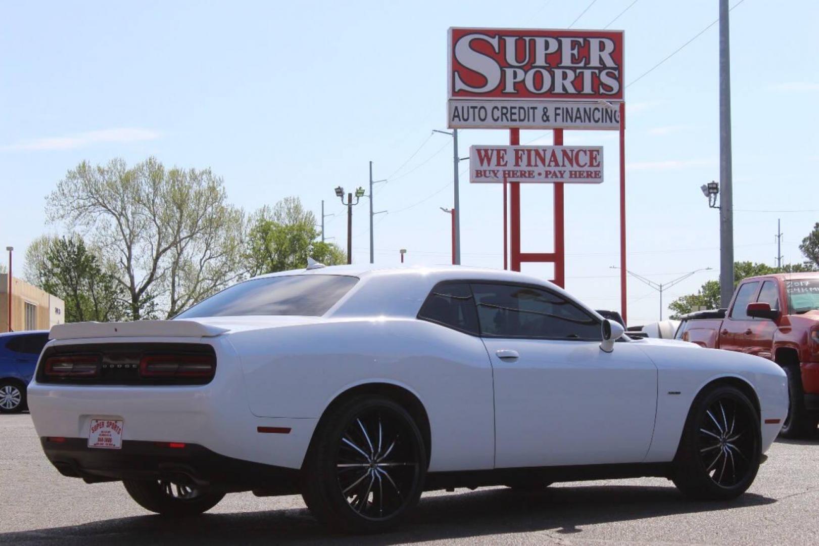 2017 White Dodge Challenger R/T Plus (2C3CDZBTXHH) with an 5.7L V8 OHV 16V engine, Automatic 8-Speed transmission, located at 4301 NW 39th , Oklahoma City, OK, 73112, (405) 949-5600, 35.512135, -97.598671 - NO DRIVERS LICENCE NO-FULL COVERAGE INSURANCE-NO CREDIT CHECK. COME ON OVER TO SUPERSPORTS AND TAKE A LOOK AND TEST DRIVE. PLEASE GIVE US A CALL AT (405) 949-5600. NO LICENSIA DE MANEJAR- NO SEGURO DE COBERTURA TOTAL- NO VERIFICACCION DE CREDITO. POR FAVOR VENGAN A SUPERSPORTS, ECHE U - Photo#4