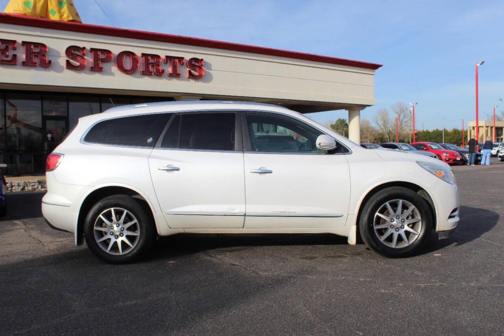 2016 White Buick Enclave Leather FWD (5GAKRBKD9GJ) with an 3.6L V6 3.6L V6 engine, Automatic 6-Speed transmission, located at 4301 NW 39th , Oklahoma City, OK, 73112, (405) 949-5600, 35.512135, -97.598671 - NO DRIVERS LICENCE NO - FULL COVERAGE INSURANCE-NO CREDIT CHECK. COME ON OVER TO SUPER SPORTS AND TAKE A LOOK AND TEST DRIVE PLEASE GIVE US A CALL AT (405) 949-5600. NO LICENCIA DE MANEJAR - NO SEGURO DE COBERTURA TOTAL - NO VERIFICACION DE CREDITO. POR FAVOR VENGAN A SUPERSPORTS, ECHE- Photo#2