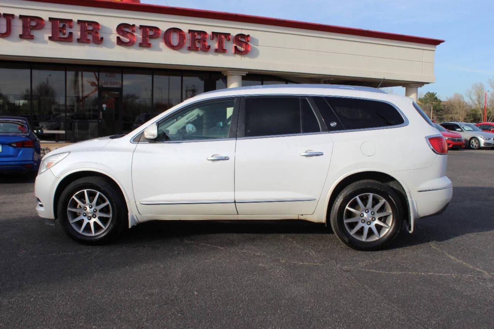 2016 White Buick Enclave Leather FWD (5GAKRBKD9GJ) with an 3.6L V6 3.6L V6 engine, Automatic 6-Speed transmission, located at 4301 NW 39th , Oklahoma City, OK, 73112, (405) 949-5600, 35.512135, -97.598671 - NO DRIVERS LICENCE NO - FULL COVERAGE INSURANCE-NO CREDIT CHECK. COME ON OVER TO SUPER SPORTS AND TAKE A LOOK AND TEST DRIVE PLEASE GIVE US A CALL AT (405) 949-5600. NO LICENCIA DE MANEJAR - NO SEGURO DE COBERTURA TOTAL - NO VERIFICACION DE CREDITO. POR FAVOR VENGAN A SUPERSPORTS, ECHE- Photo#5
